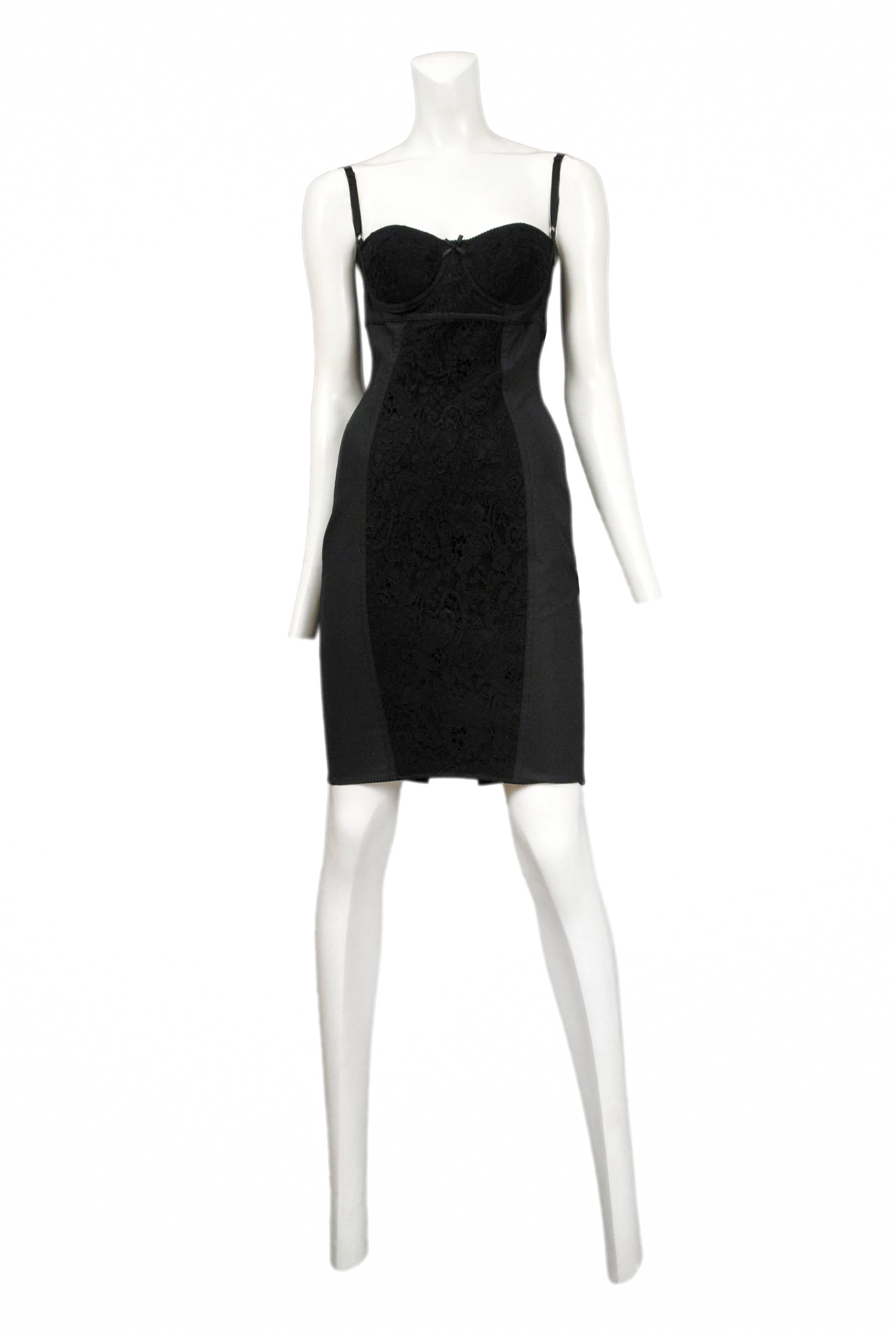 Dolce and Gabbana lace panel corset dress with boning and adjustable straps.
