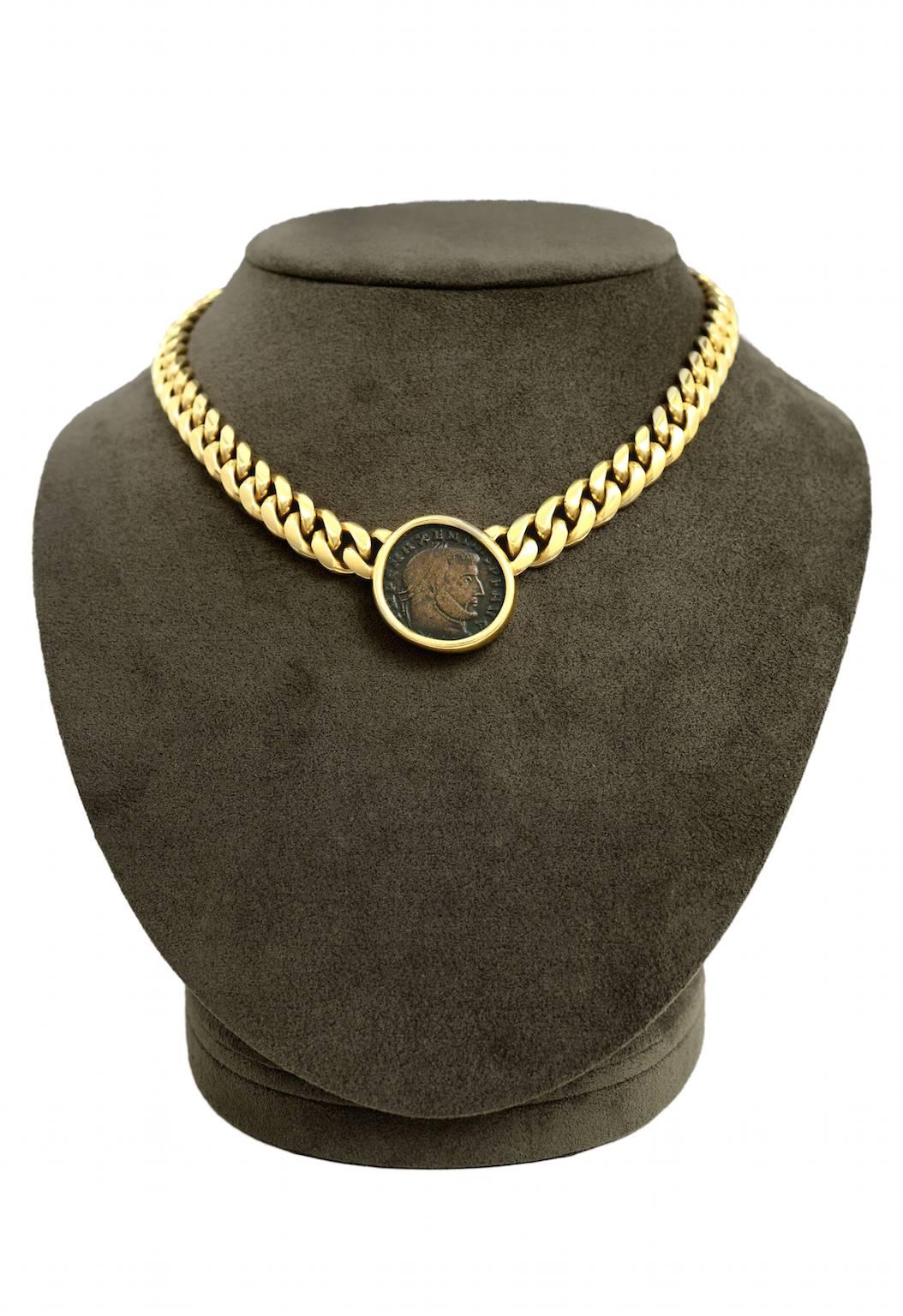 A classic and large Bulgari Monete necklace with heavy 18K gold curb link chain. Coin dates 306 - 312 AD. Stamped BULGARI ITALY on back of clasp. Necklace circa 1970's. 

*Please contact for addition images or information. 