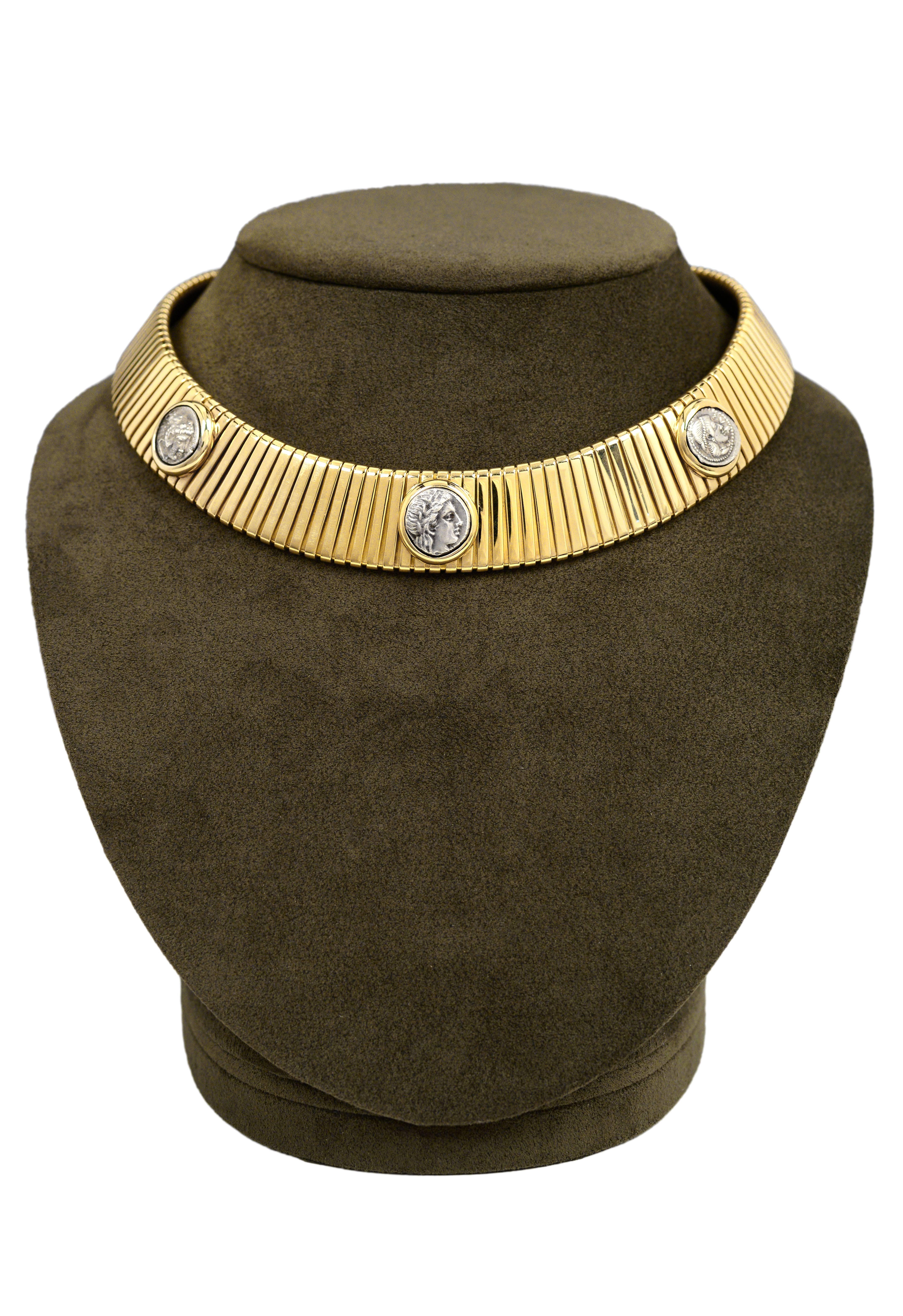 Bulgari  Monete 18K gold Tubogas choker necklace with three silver ancient coins. Stamped BULGARI on back of clasp. Circa 1980's. 

*Please contact for addition images or information. 