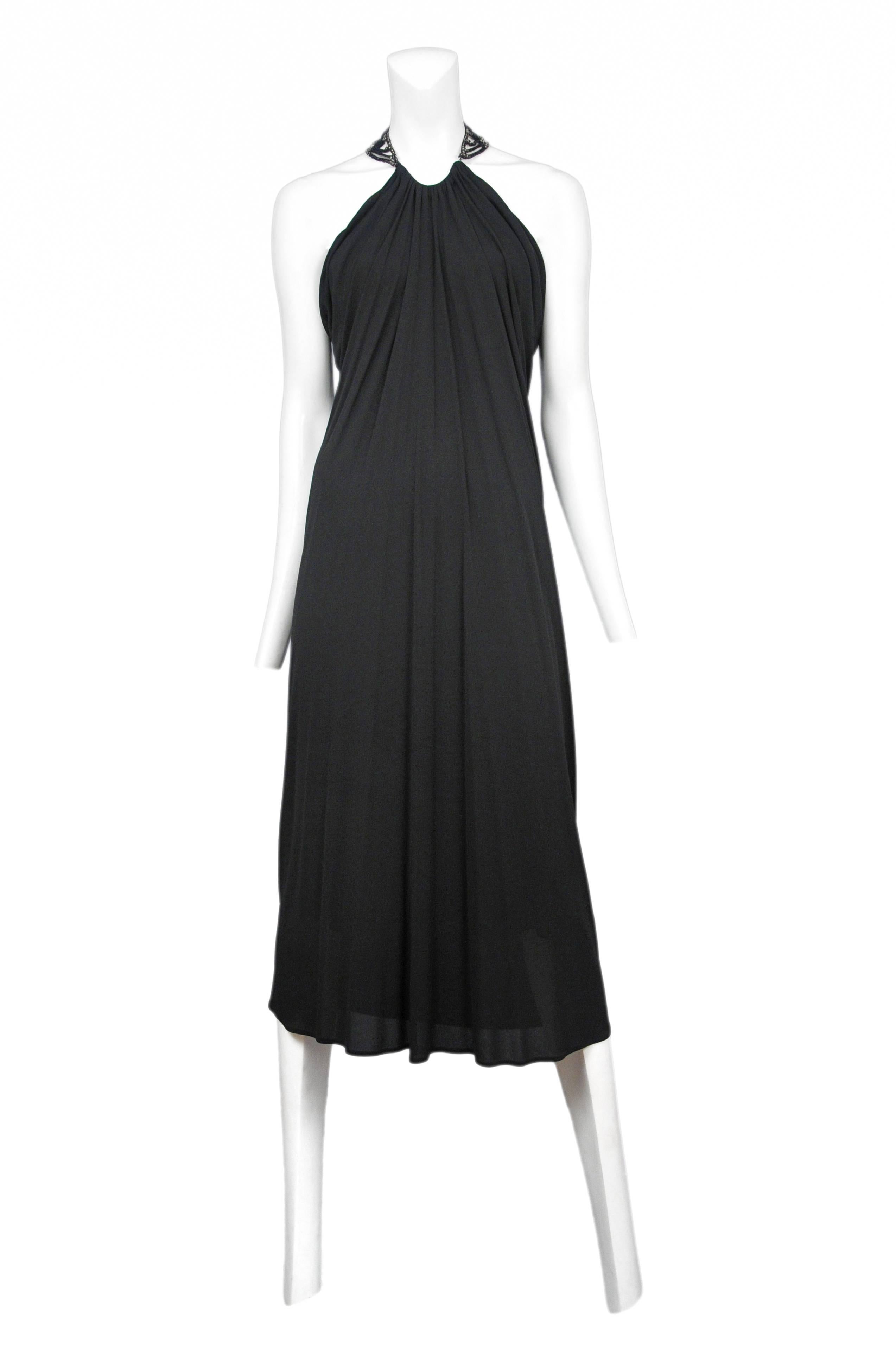 Black beaded necklace with attached black jersey drape dress. The Man Who Knew Too Much Collection AW 2005.

Please contact for additional information or photos.