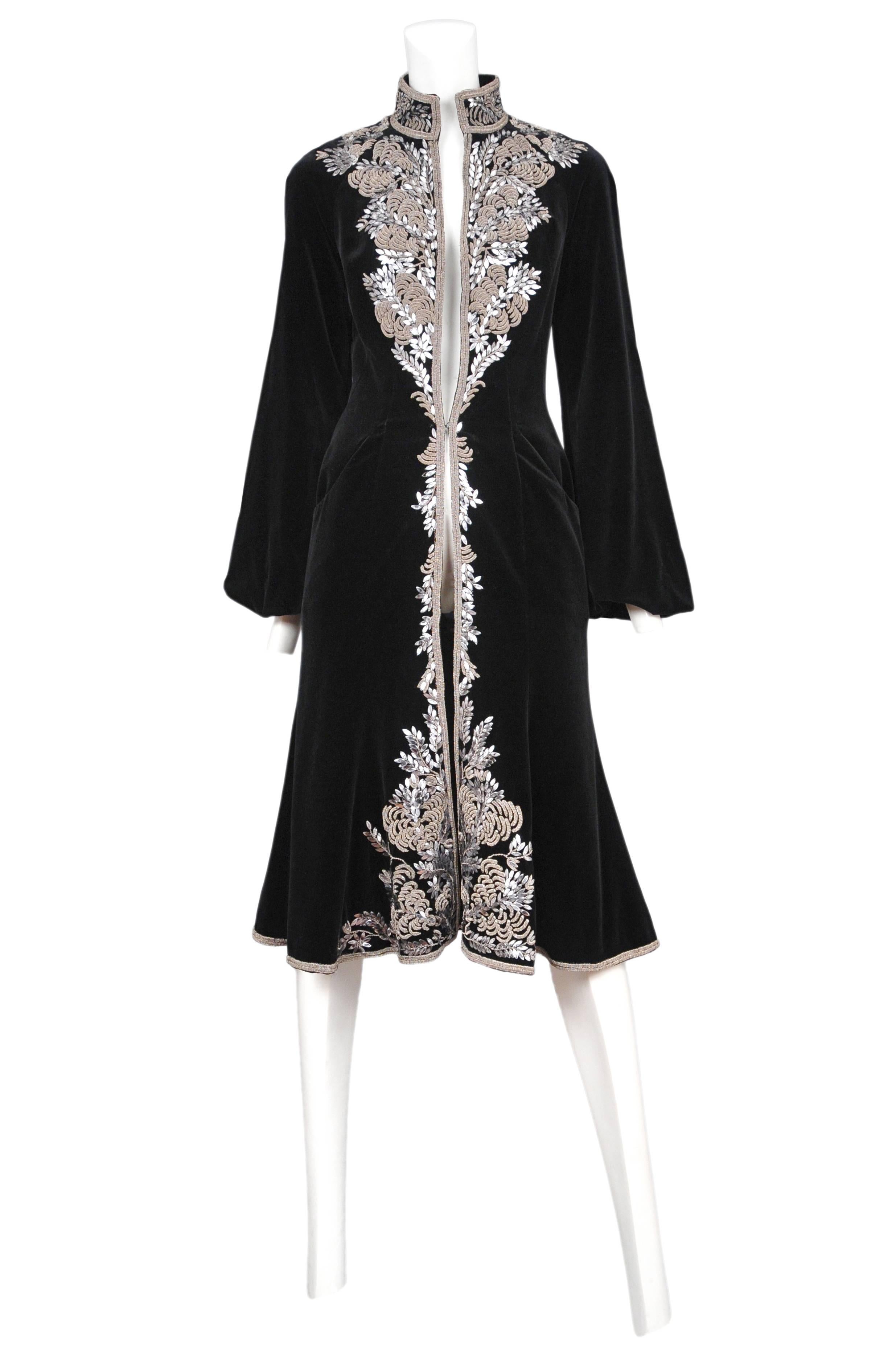 Black velvet heavily embroidered coat with metal paillettes. A similar coat was worn by Isabella Blow. Circa 2004.