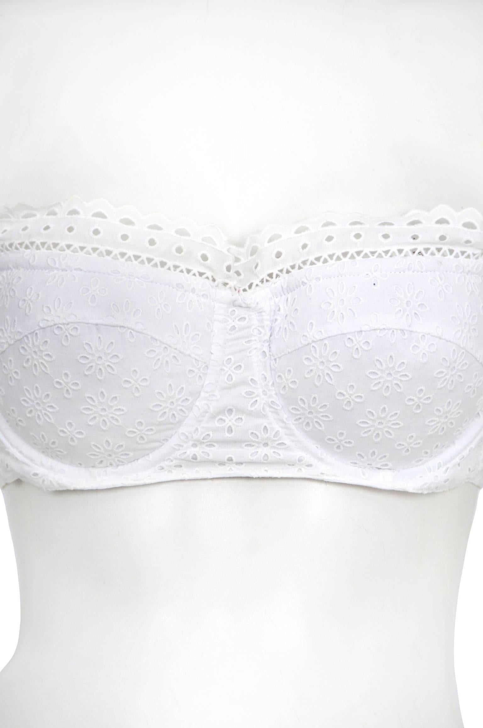 Vintage Azzedine Alaia white cotton eyelet lace bra top featuring built in underwire padded cups.

Please contact us for additional photos.