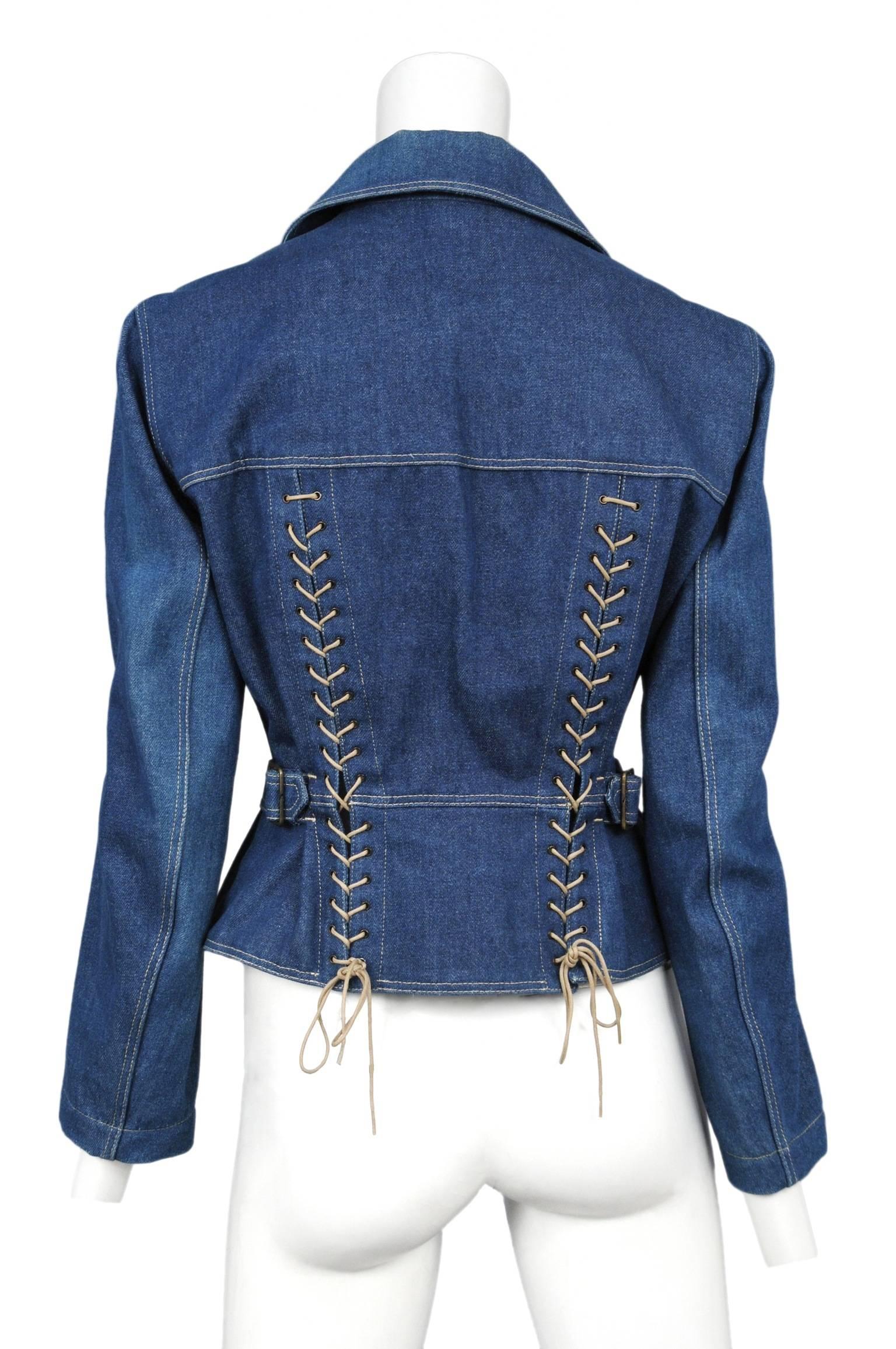 Vintage Azzedine Alaia blue denim double breasted jacket featuring lace up detailing along both darts at the back. Good Vintage Condition with minor fading along the sleeves, shoulders and collar.

Please contact us for additional photos.