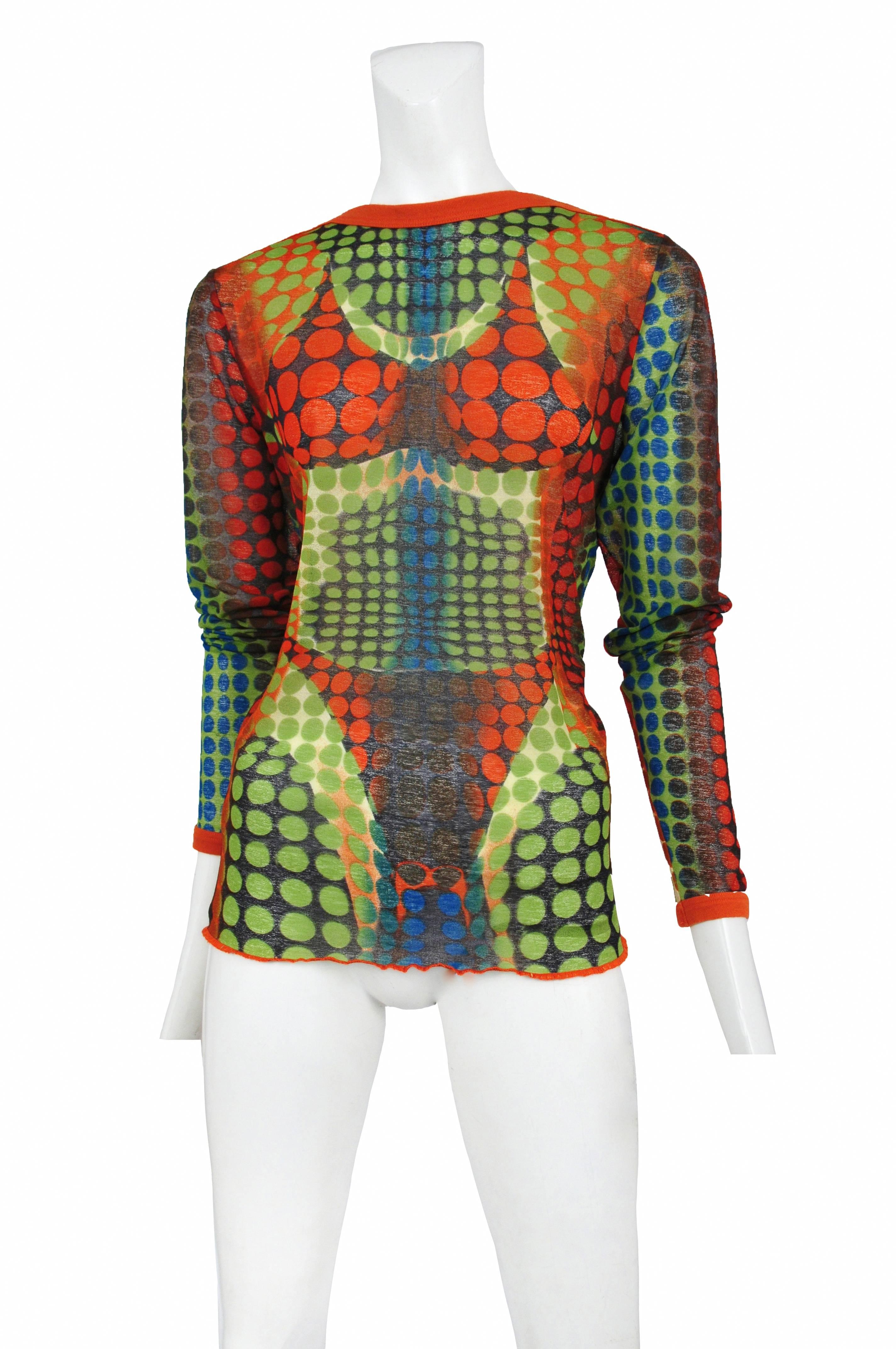Vintage Jean Paul Gaultier iconic mesh long sleeve top with bikini motif in dot formations. Circa 1995.

Please inquire for additional images.