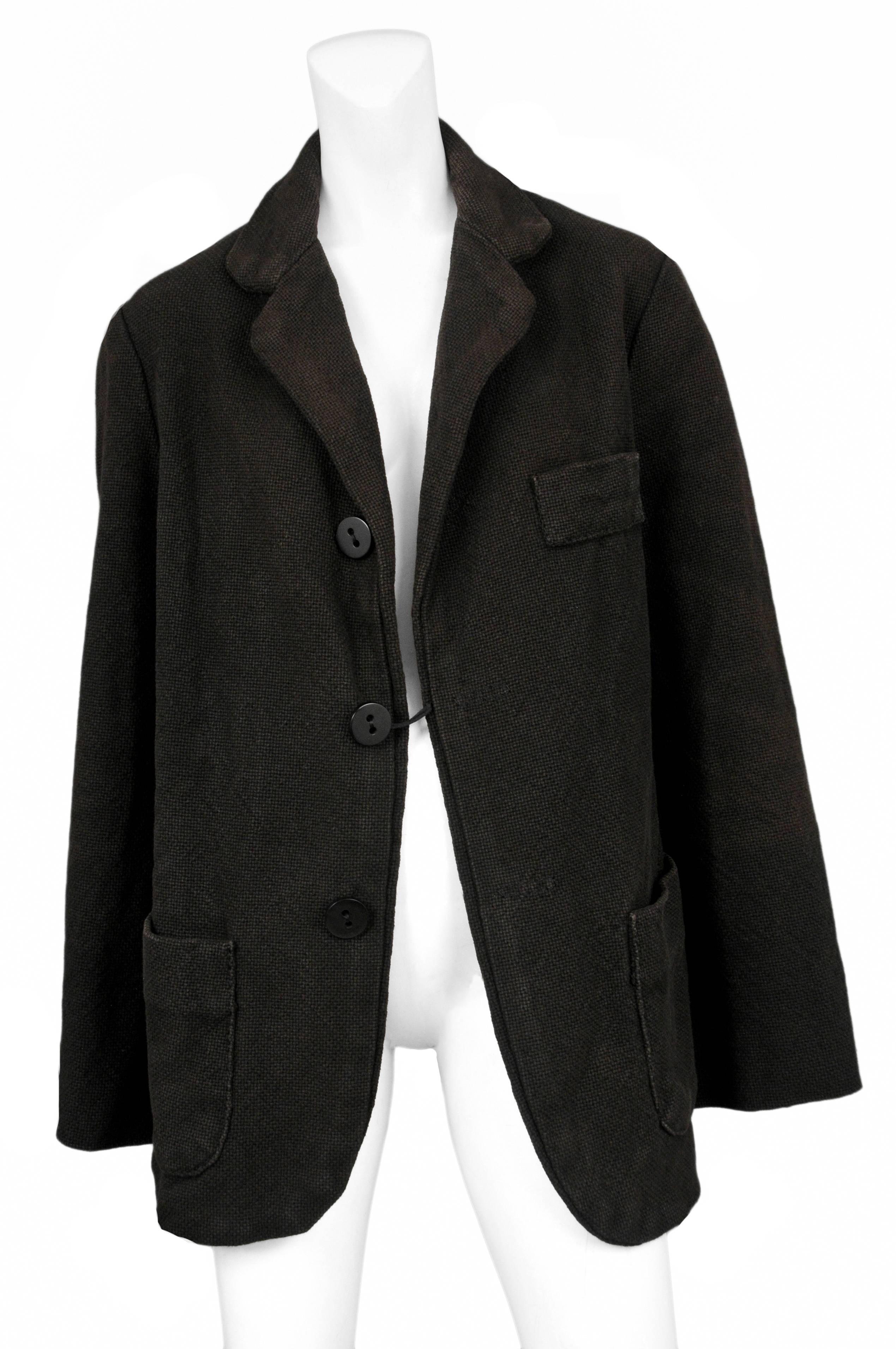 Vintage Martin Margiela brown wool oversized jacket with three large buttons at front and breast and side pockets. From the Doll Collection Autumn / Winter 1994-95.
Please inquire for additional images.