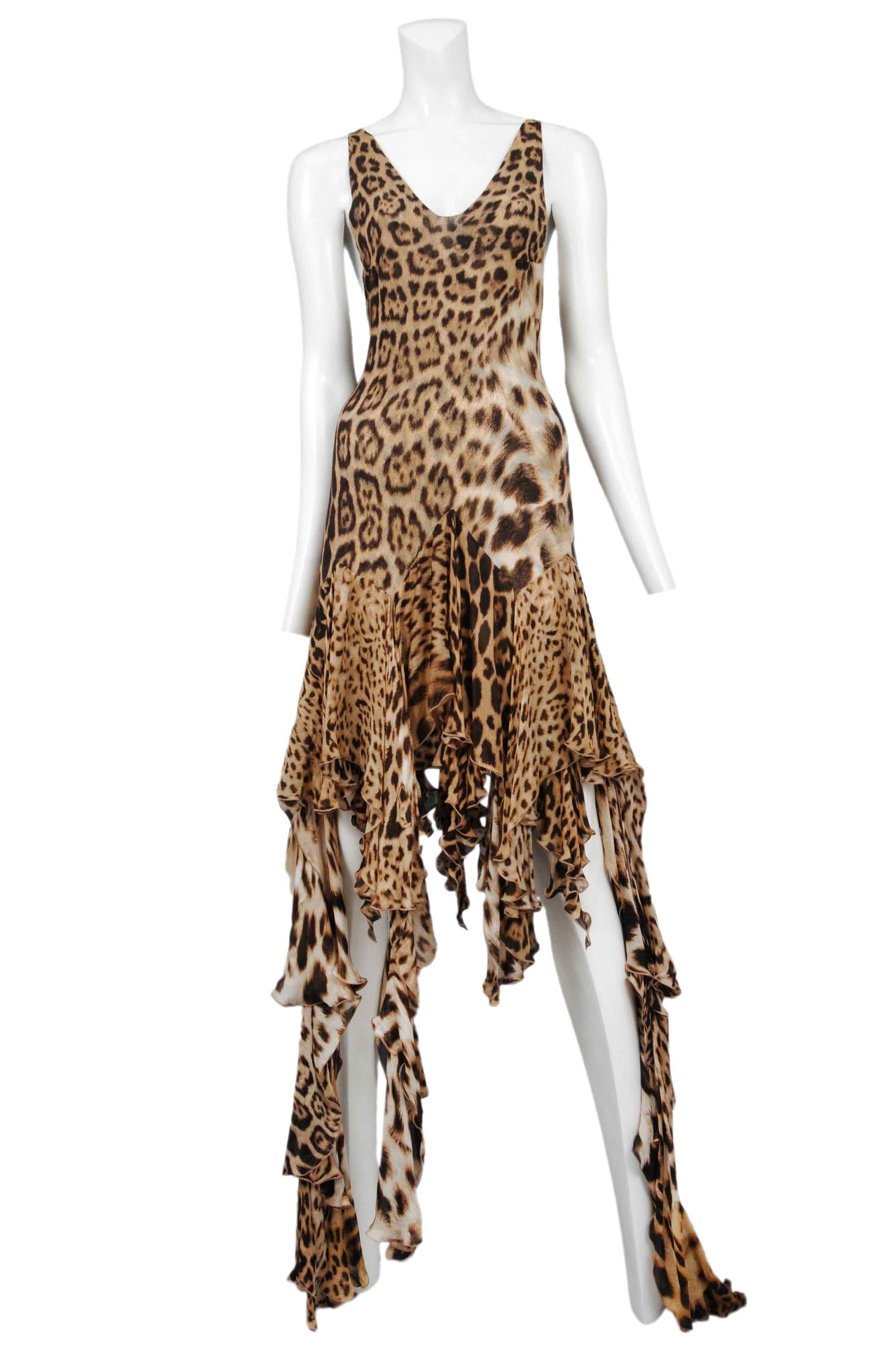 Vintage Roberto Cavalli silk sleeveless gown featuring an allover mixed leopard print and ruffled panels that drape unevenly from the hem.
Please inquire for additional images.