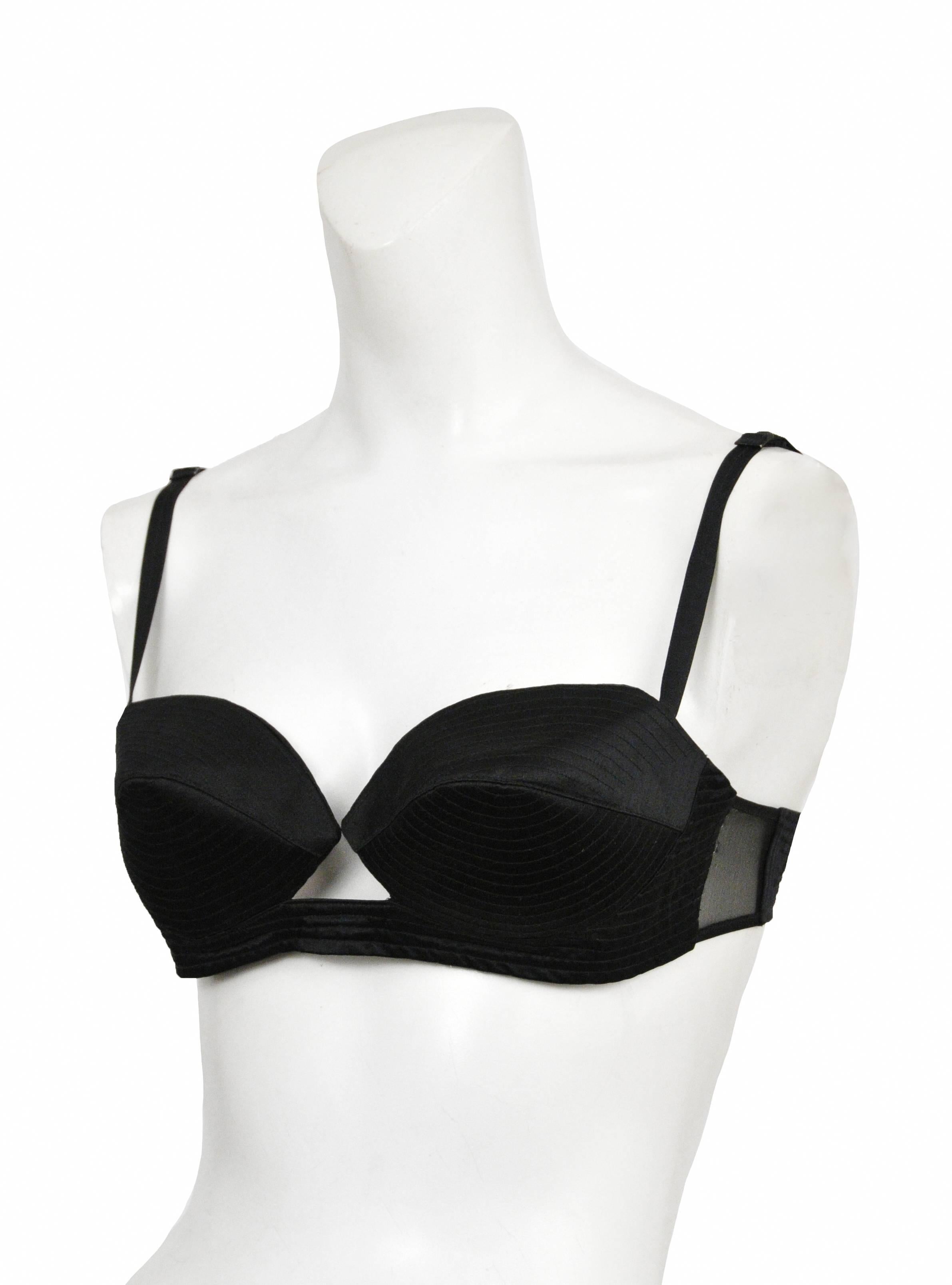 Vintage Tom Ford for Gucci black silk satin bra featuring quilting details and mesh side panels. Runway piece from the Spring Summer 2001 Collection.
Please inquire for additional images.