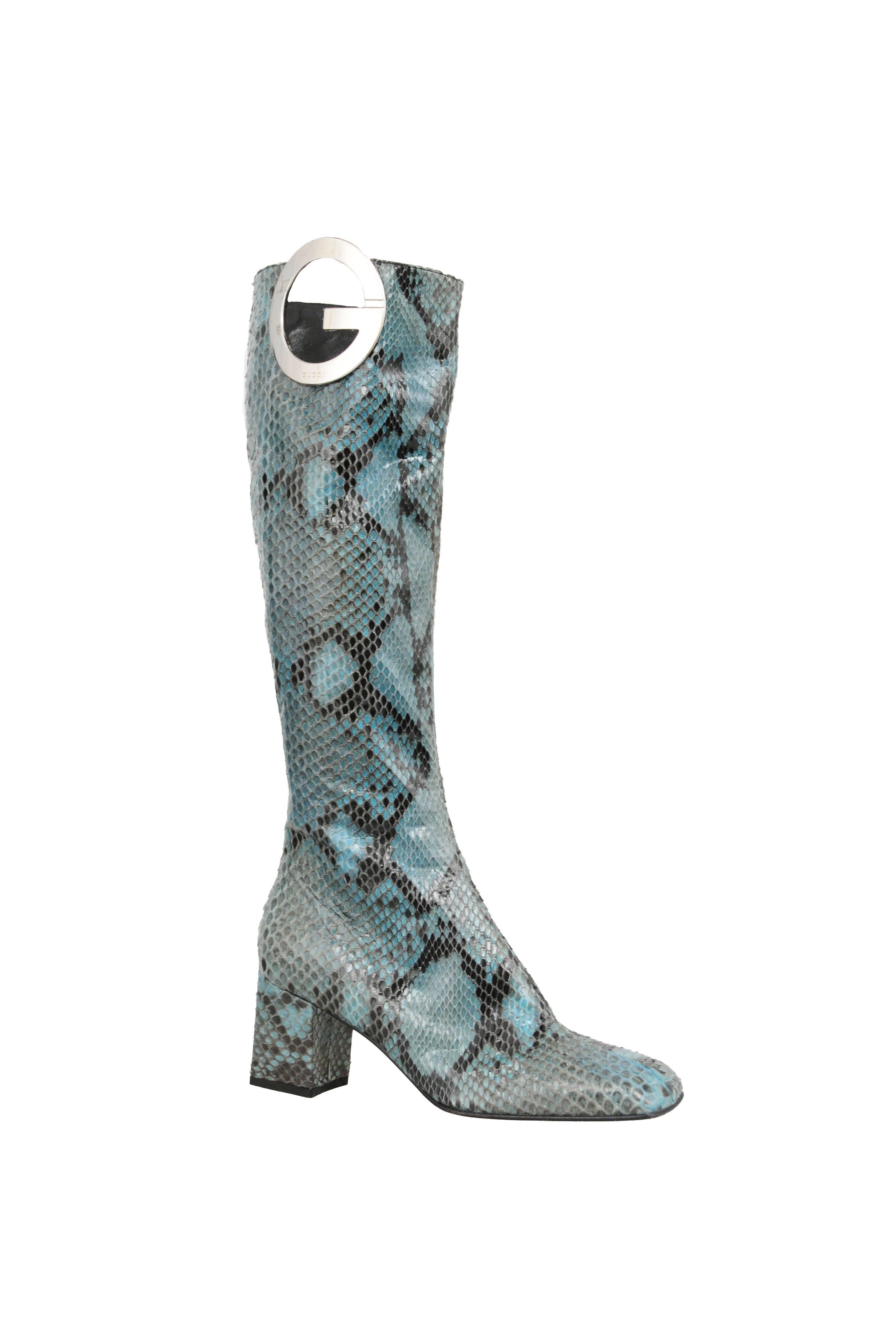 Vintage Tom Ford for Gucci teal snakeskin tall boots with silver logo detail. Zip closure at side. 
Please inquire for additional images.