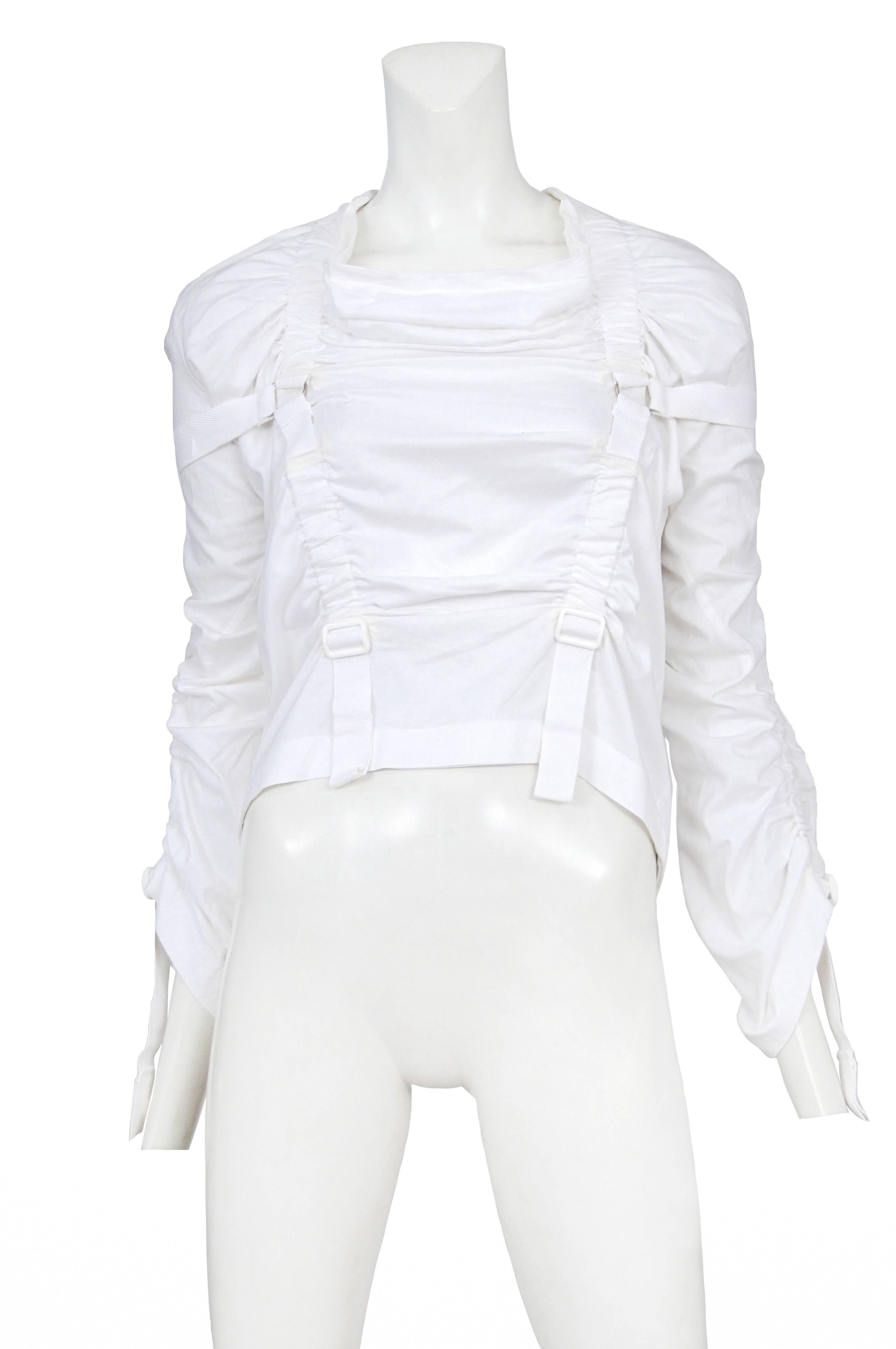 Vintage Junya Watanabe white cotton long sleeve parachute top. Circa 2003.
Please inquire for additional images.