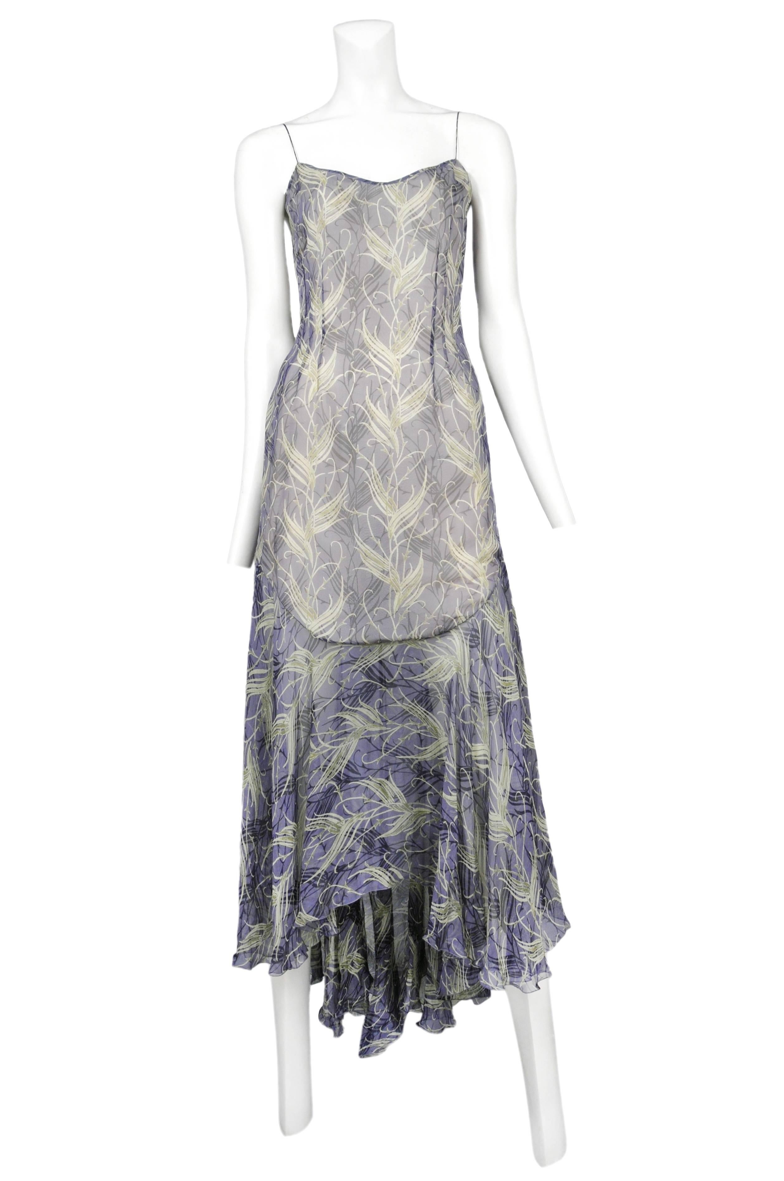 Vintage Stella McCartney for Chloe blue silk slip dress featuring a pastel green abstract feather print, a darted bodice, drop waist and spaghetti straps. Runway piece from the 1999 Spring / Summer Collection.
Please inquire for additional images.