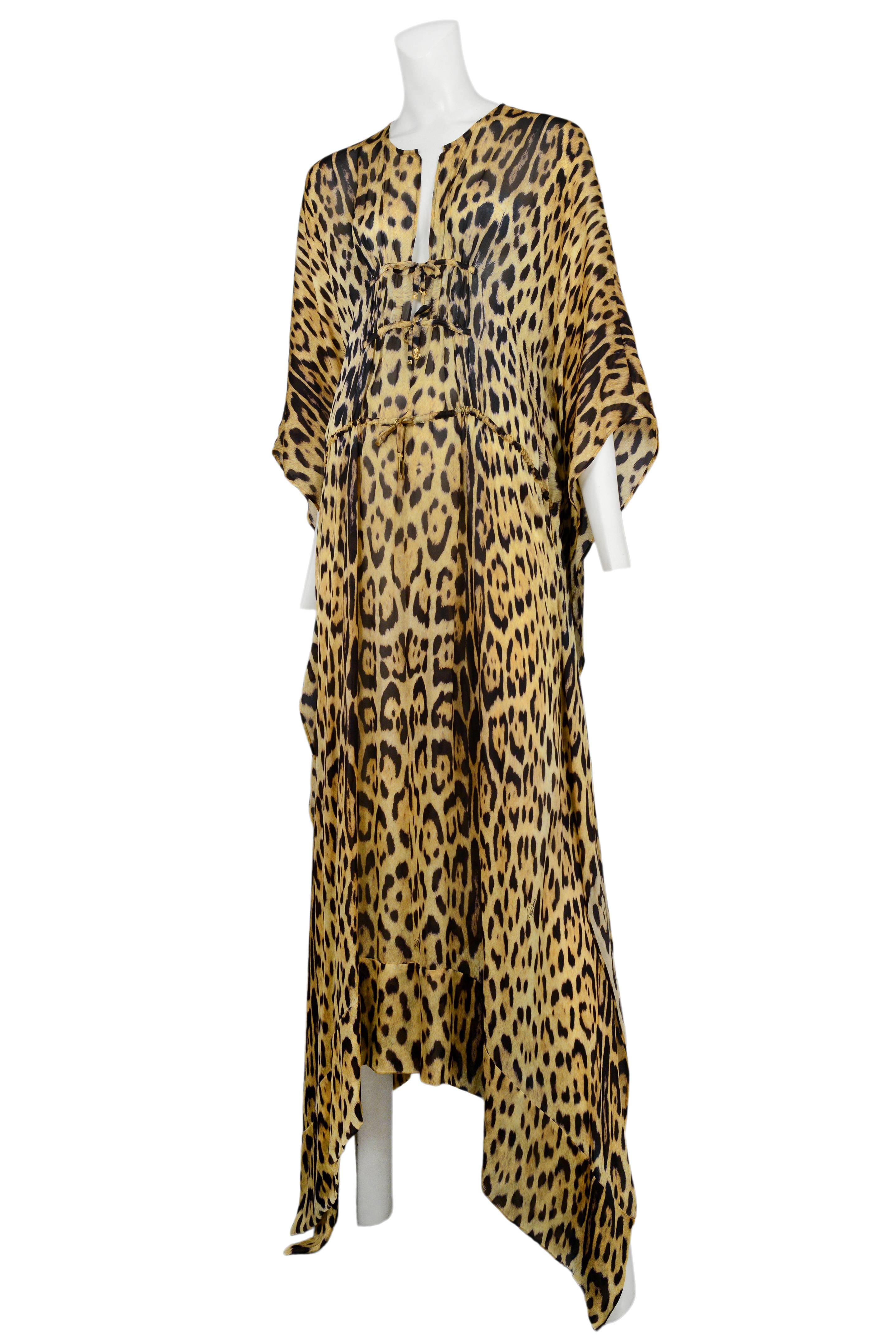 Vintage Roberto Cavalli silk leopard print caftan featuring ties at the center front and a drawstring at the lower waist.
Please inquire for additional images.