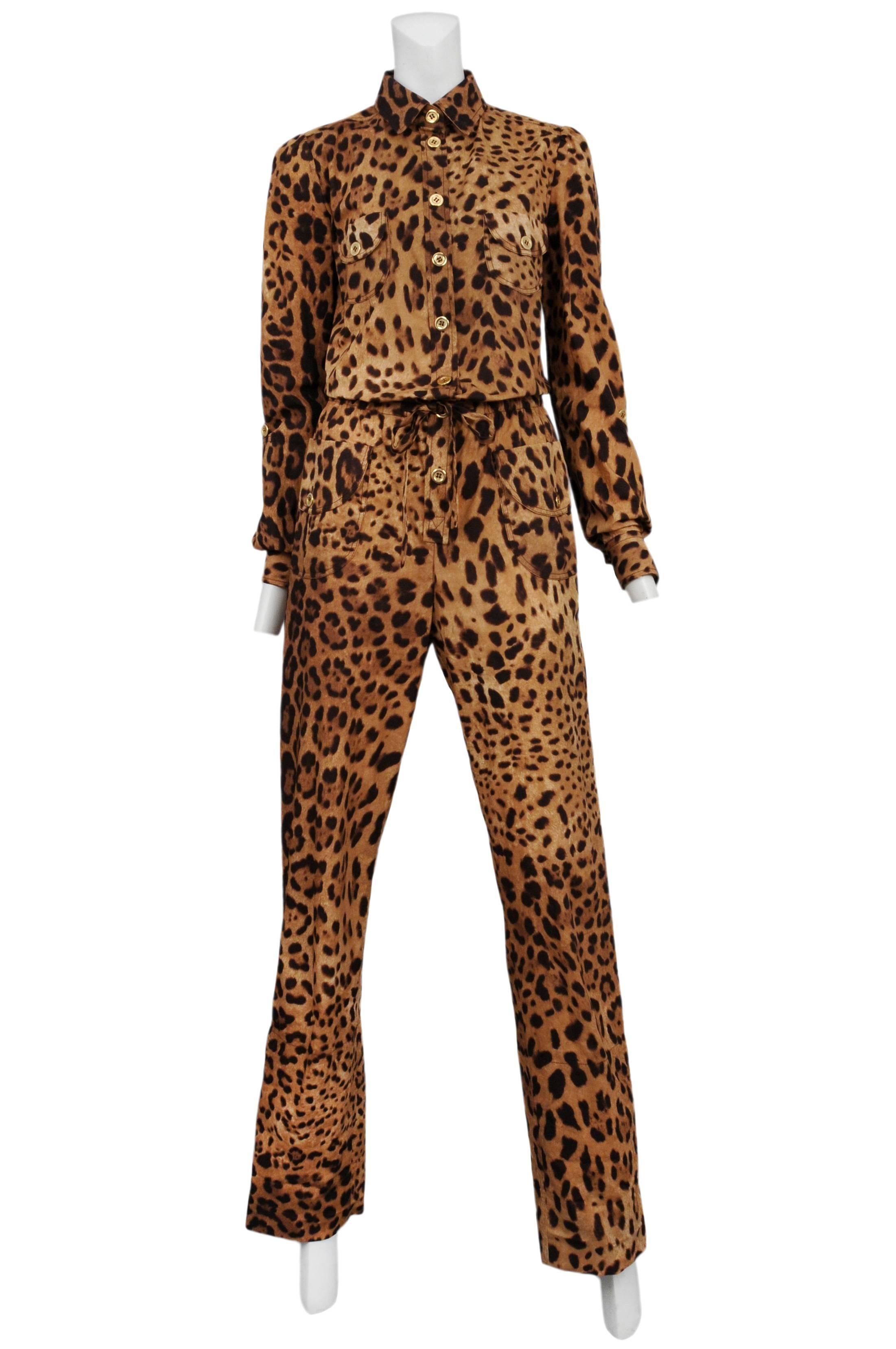 Vintage Dolce & Gabbana leopard jumpsuit featuring gold buttons, chest and hip pockets, and a drawstring at the waist.
Please inquire for additional images.