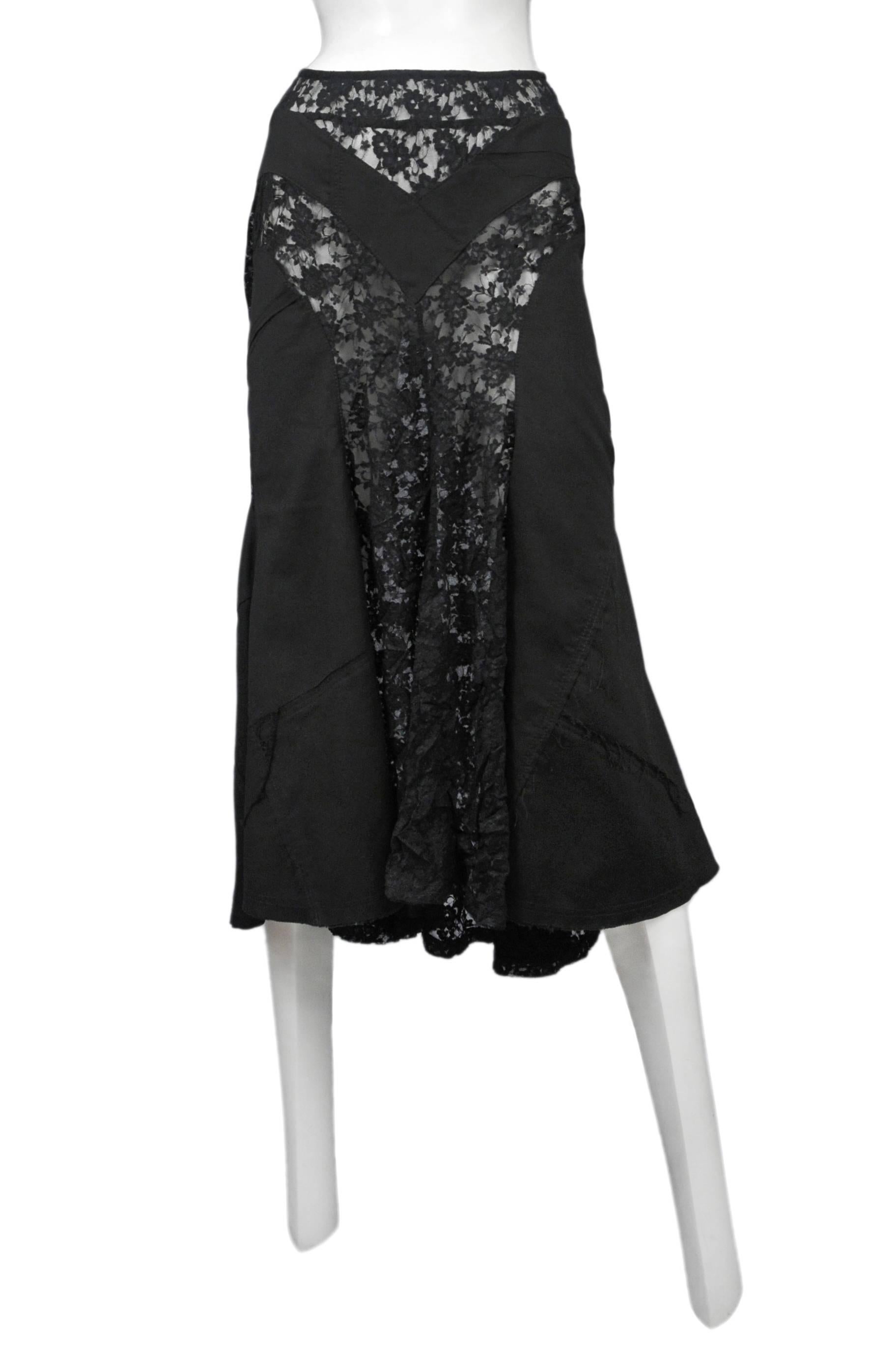 Vintage Junya Watanabe black below the knee skirt featuring lace paneling throughout.