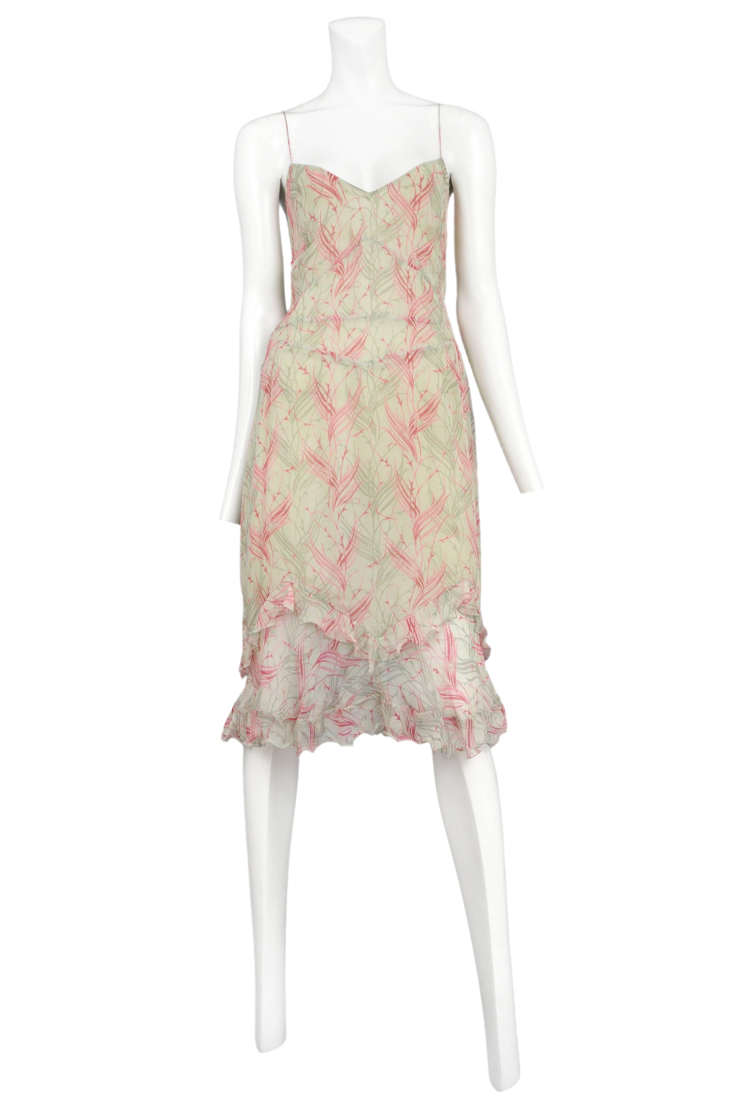 Vintage Stella McCartney for Chloe pastel green silk knee length slip dress featuring a pink abstract feather print and two tiers of ruffles at the hem. Runway piece from the 1999 Spring / Summer Collection.
Please inquire for additional images.