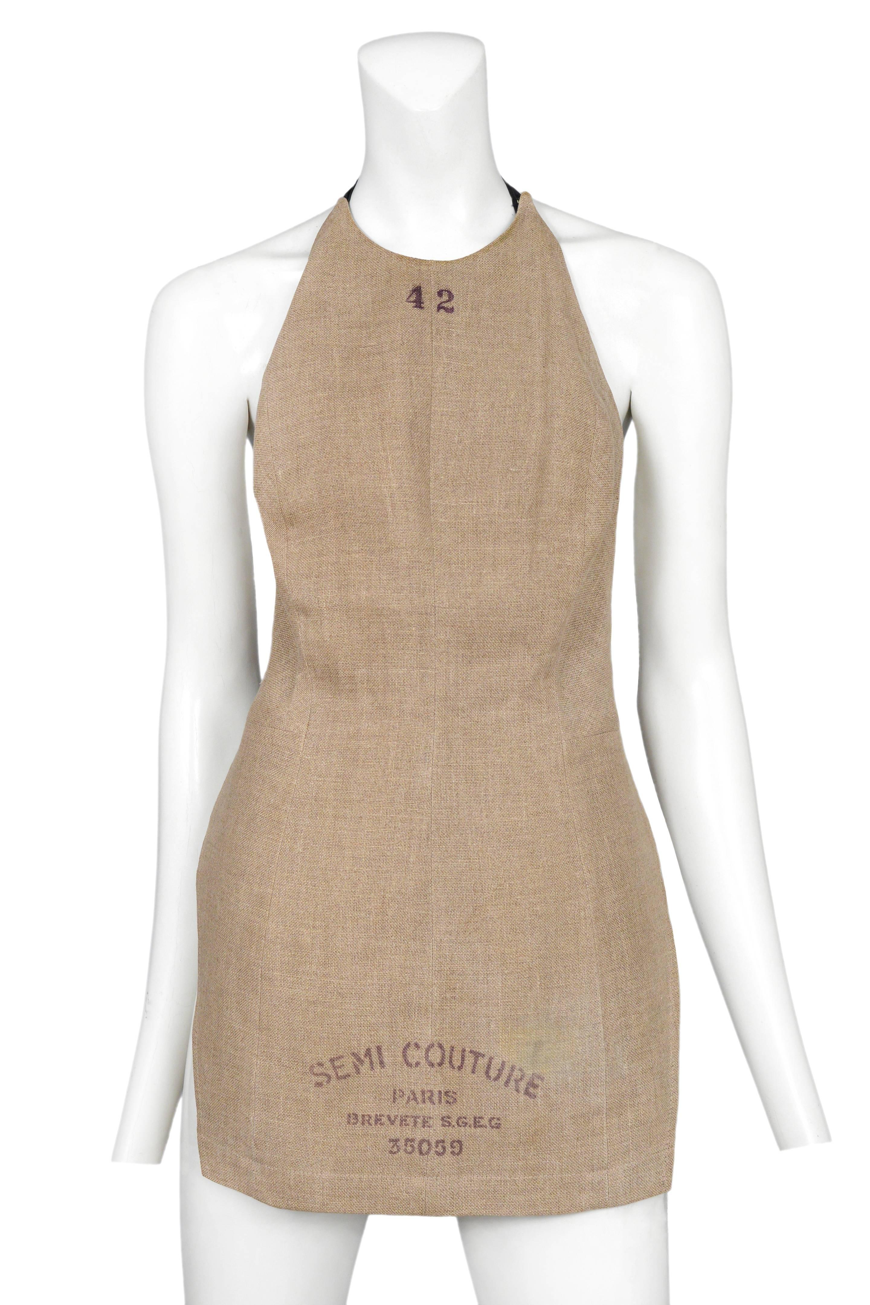 Iconic Vintage Maison Martin Margiela Semi-Couture dressmaker's bodice as an apron. Apron ties at back. From the 1997 Collection.
Please inquire for additional images.