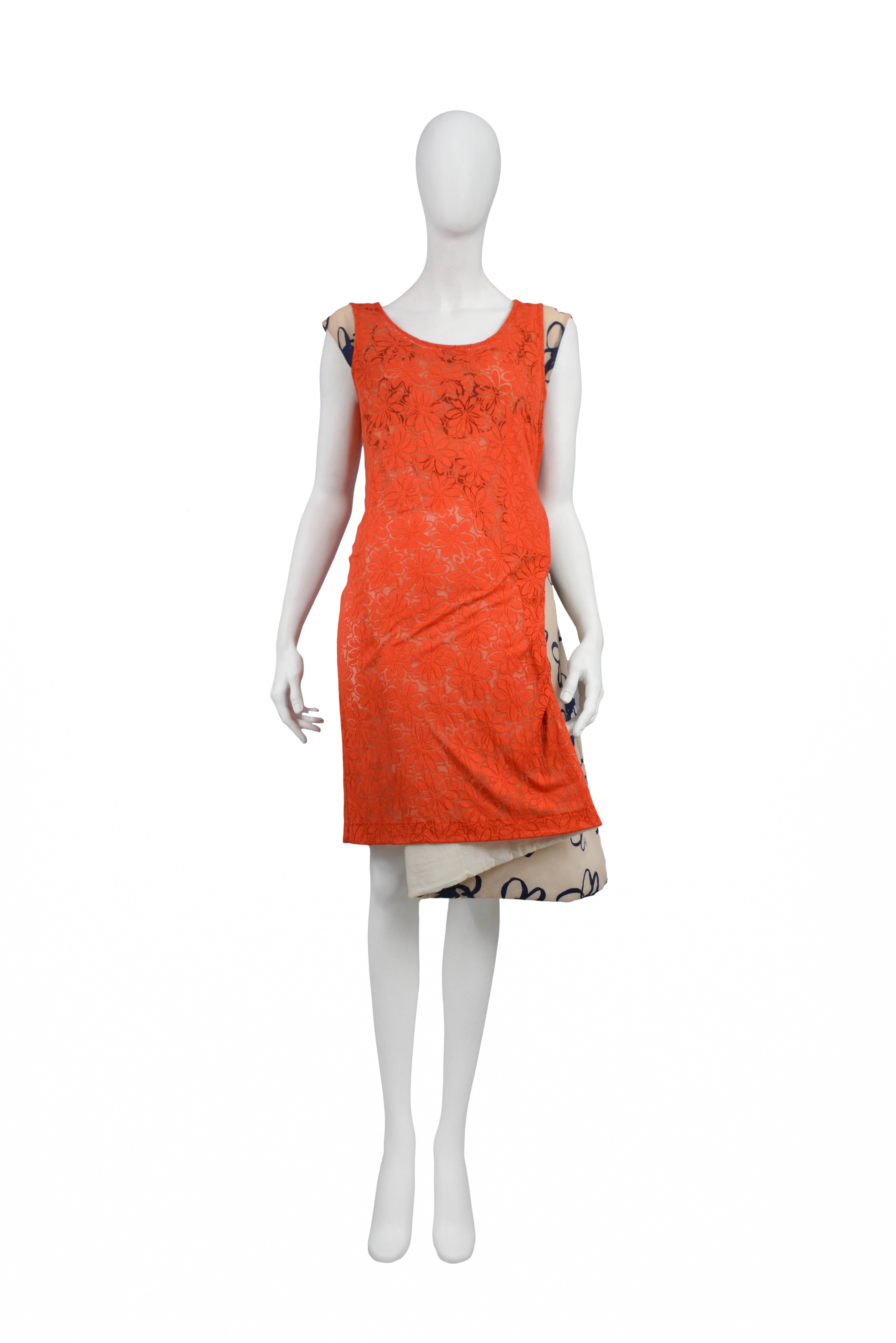 Very rare padded floral wrap dress with red lace outer layer. AW 1996.
Please inquire for additional images,