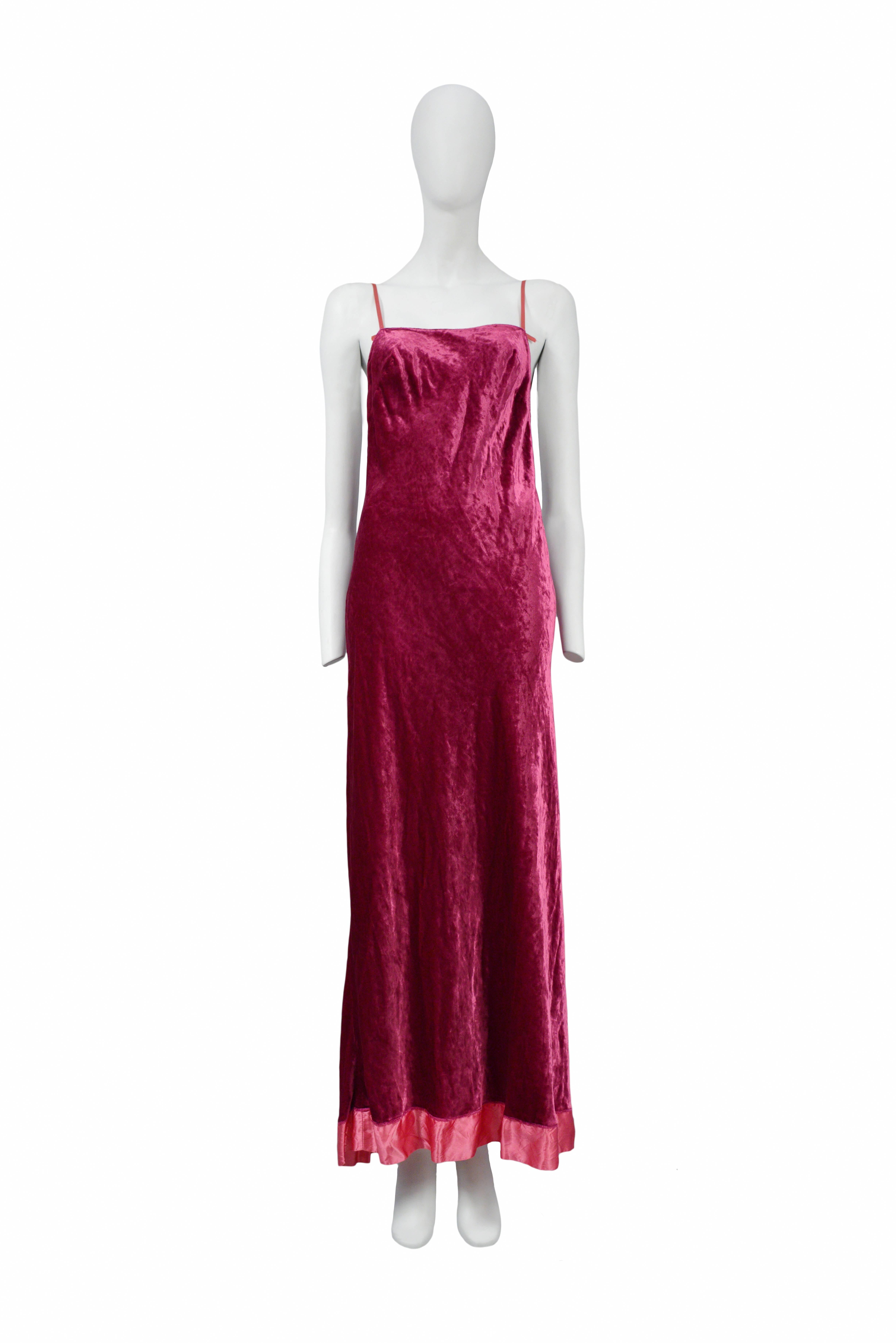Vintage Maison Martin Margiela iconic pink velvet slip dress featuring satin straps, an open back and pink satin trim at the hem. Circa 1995.
Please inquire for additional images.