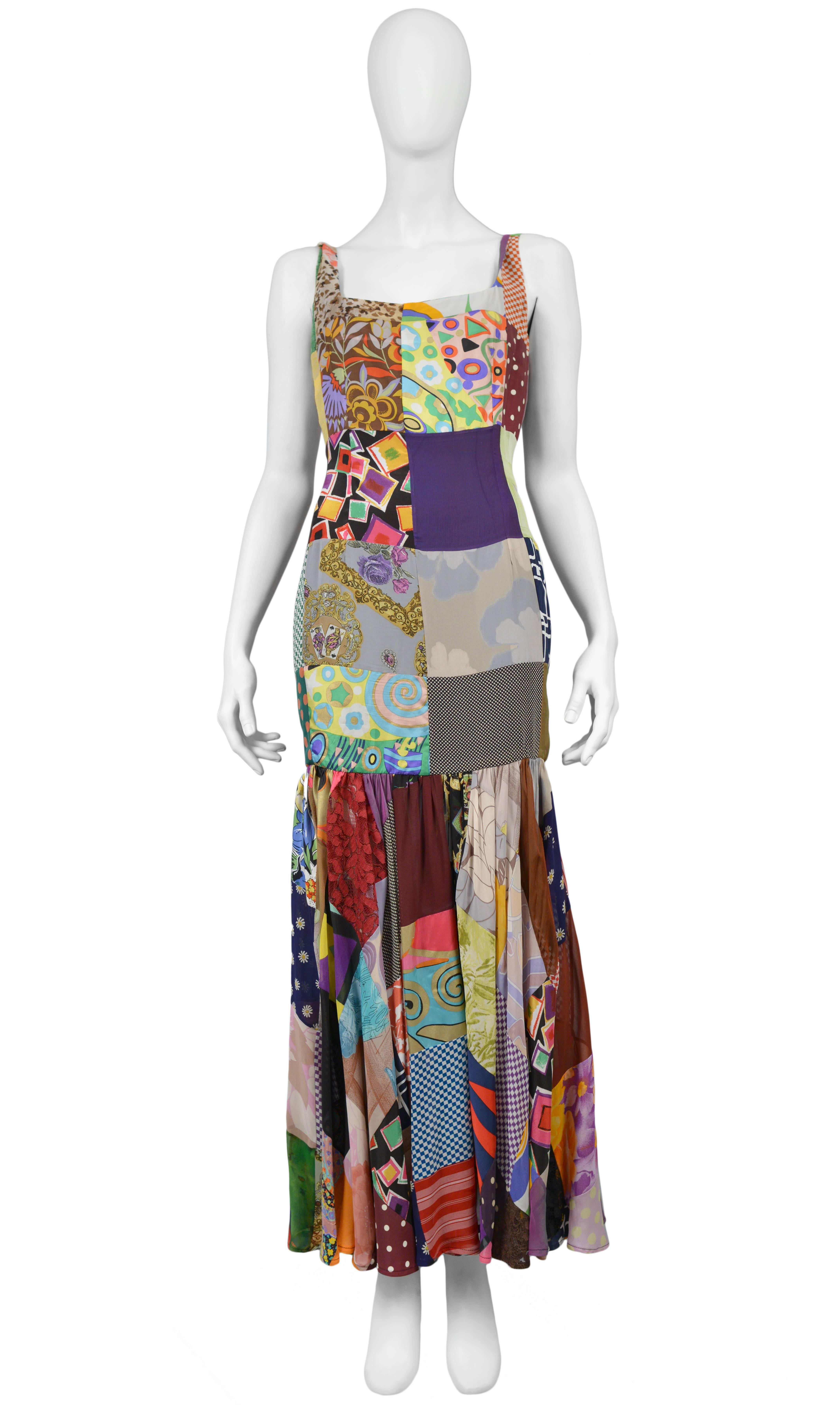 Vintage Dolce & Gabbana sleeveless maxi gown featuring a flounce at the hem and multicolor printed fabrics sewn together in a patchwork style. Circa 1993.
Please inquire for additional images.
