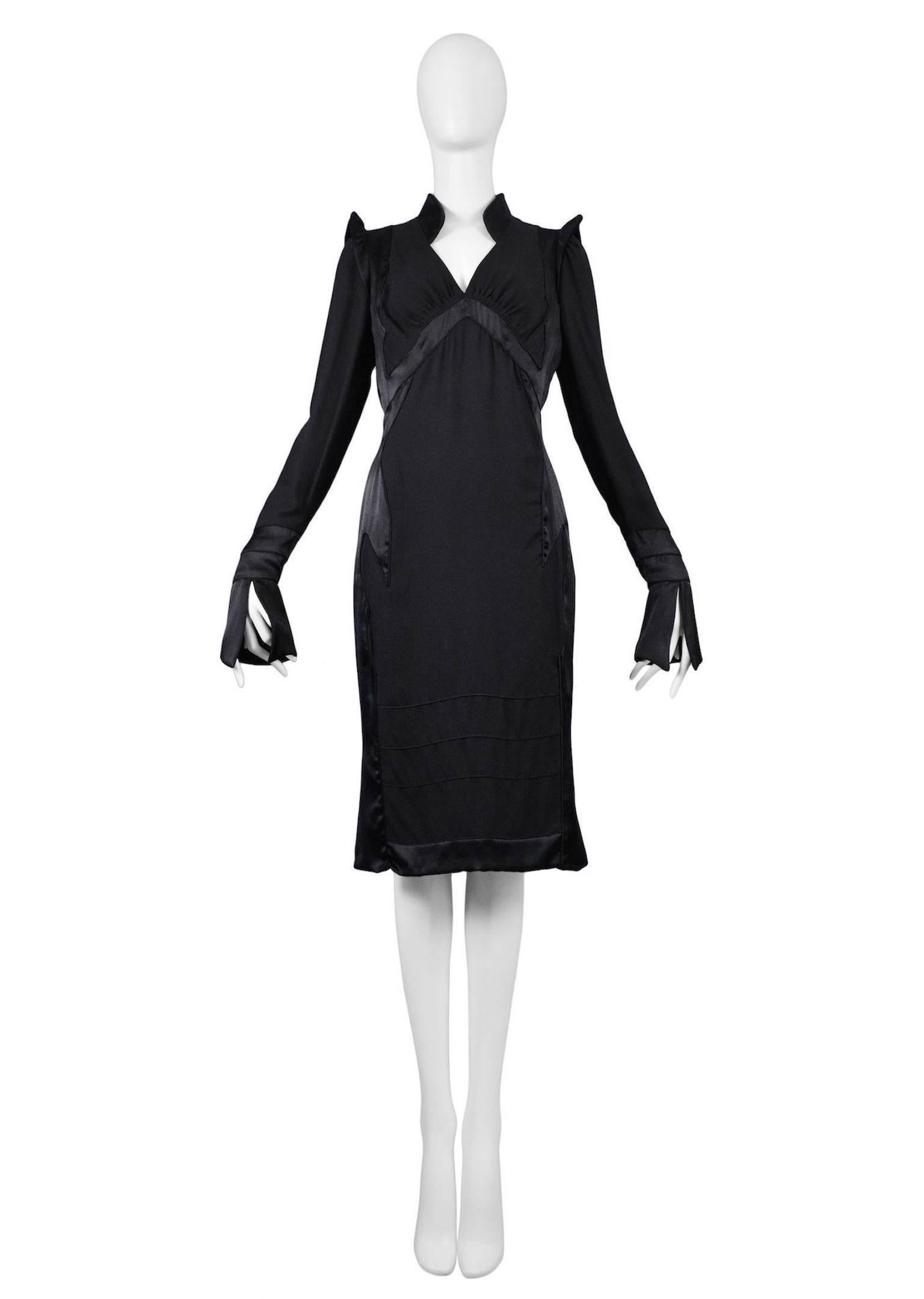 Vintage Tom Ford for Yves Saint Laurent black silk dress featuring structured collar and shoulder details with back zipper closure. Runway piece from the Autumn / Winter 2004 Collection. Please inquire for additional photographs.