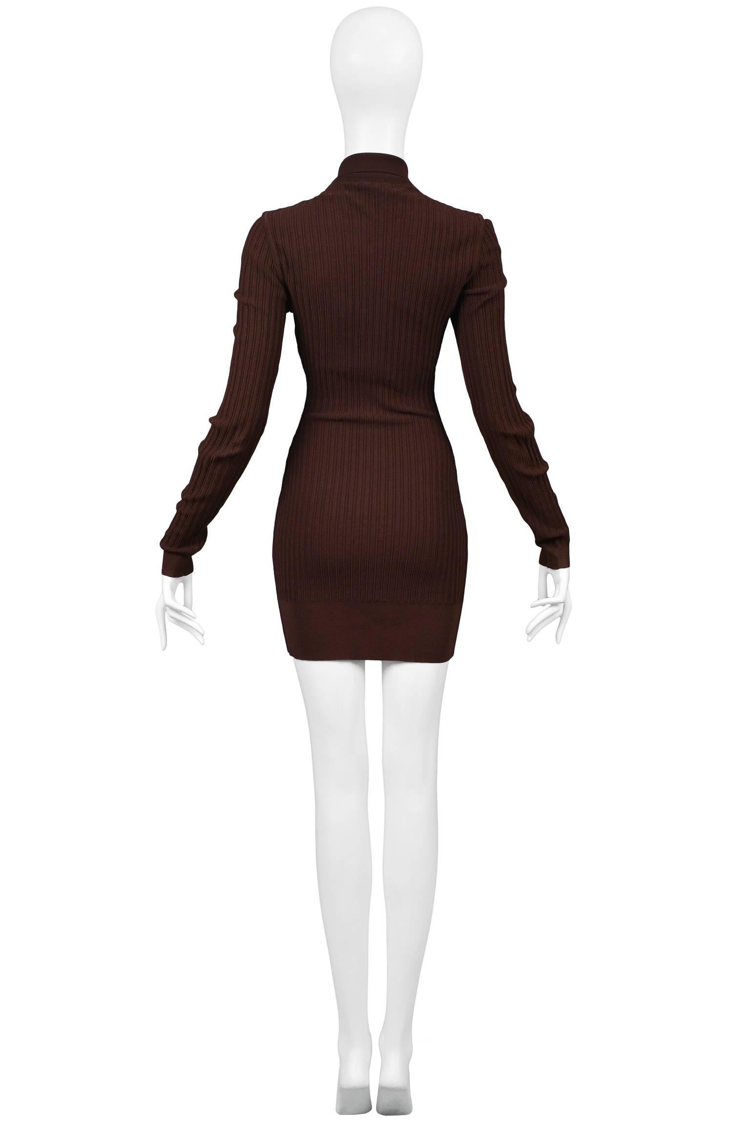 Vintage Azzedine Alaia brown knit bodycon ribbed dress with 2 way zipper closure at front. Zipper can be opened at neckline and hem of skirt. Neckline features polo style collar. Please inquire for additional photographs. 