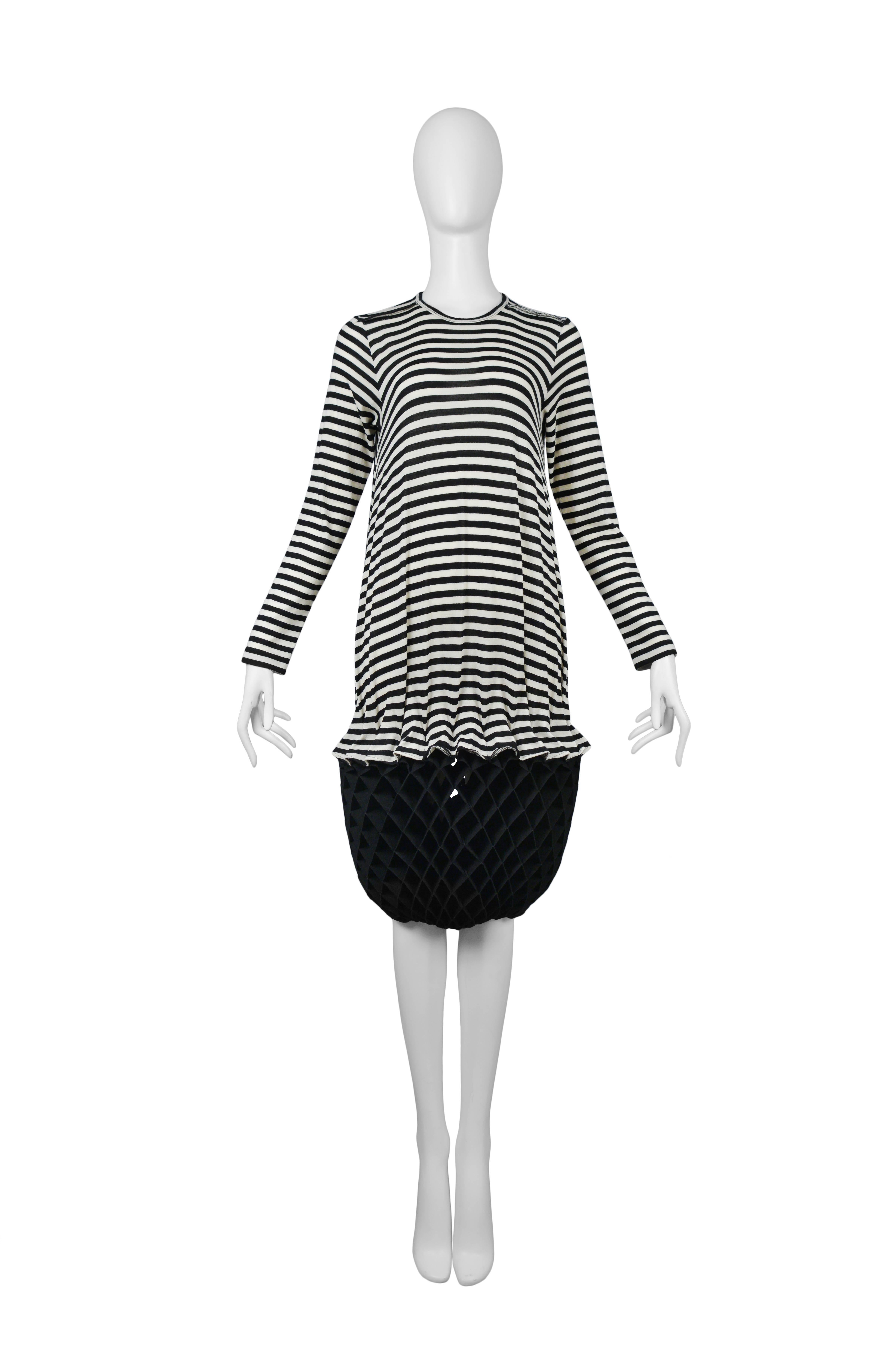 Junya Watanabe black and white stripe dress featuring a drop waist with black accordion detailing. Circa Autumn / Winter 2015.
Please inquire for additional images.