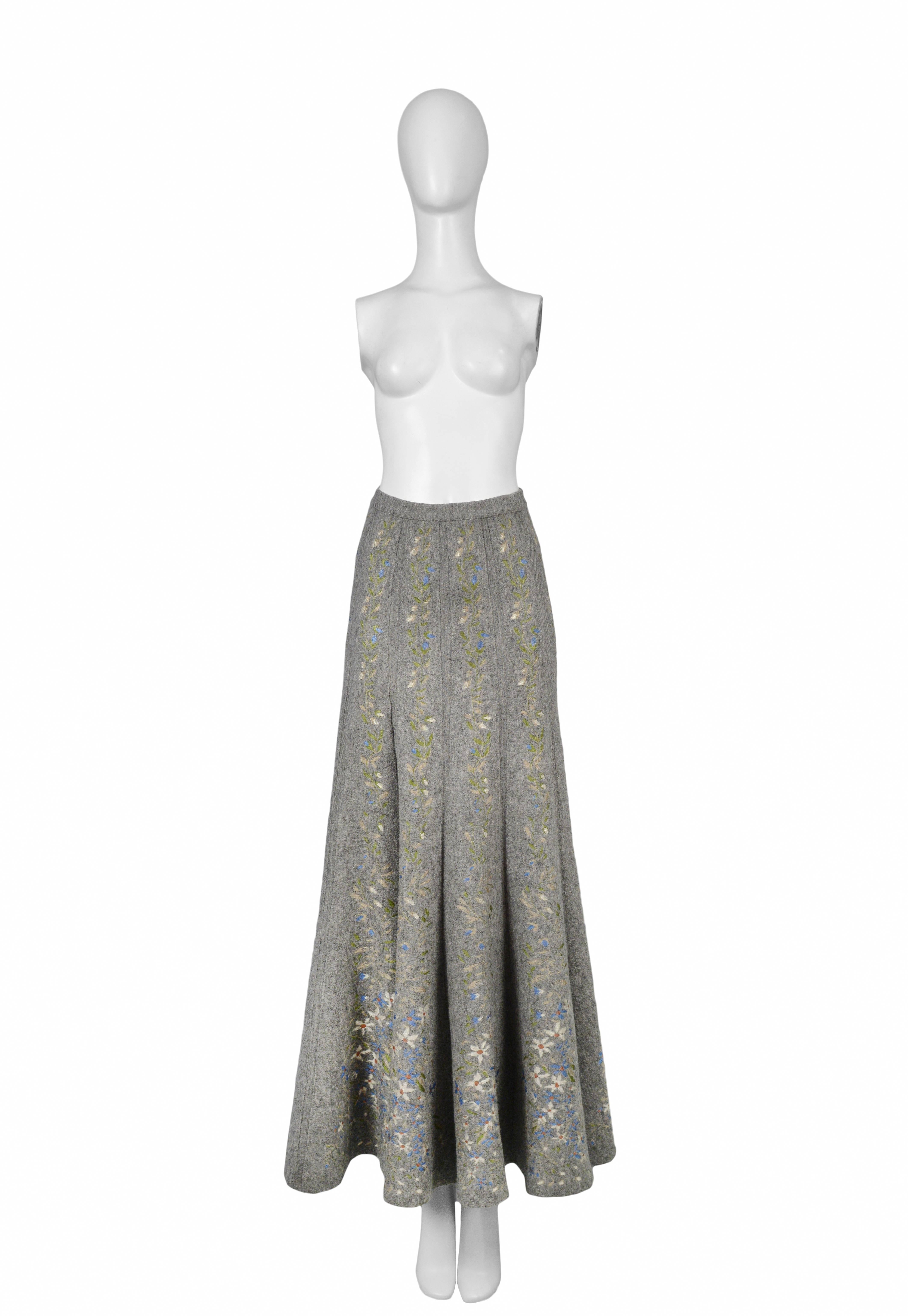 Iconic grey wool maxi skirt with floral pattern. Collection 1990.
Please inquire for additional images.