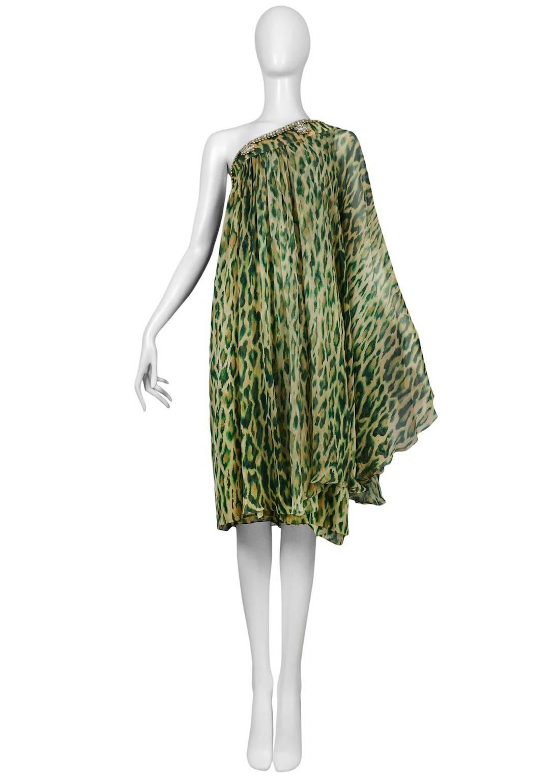 Vintage John Galliano for Christian Dior silk green leopard asymmetrical caftan with sequin and bell trim featuring a side covered button entrance. Runway piece from the Resort 2008 Collection.