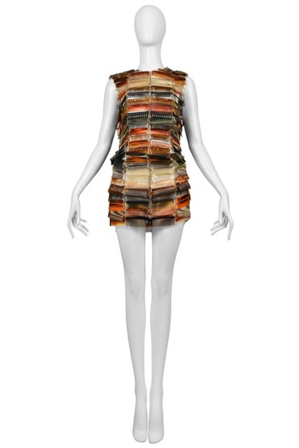 Vintage Maison Martin Margiela Couture Artisanal Comb Dress Ensemble. Hair-comb in plastic, tortoiseshell and horn are cut and assembled on a metal chain to make a top and skirt. 22 hours to produce. Runway piece from the Spring / Summer 2009