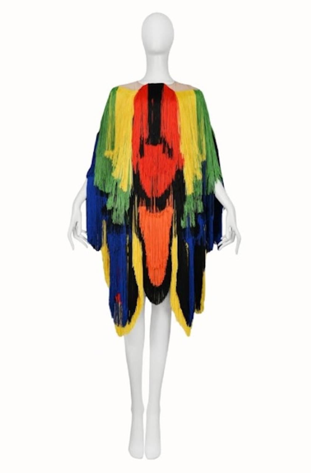 Vintage Maison Martin Margiela Couture Artisanal Kite Tunic. A tunic is made from a kite, the patterns of which are embroidered with multi-colored fringe from various kites. 35 hours to produce. Runway piece from the Spring / Summer 2009 Collection.