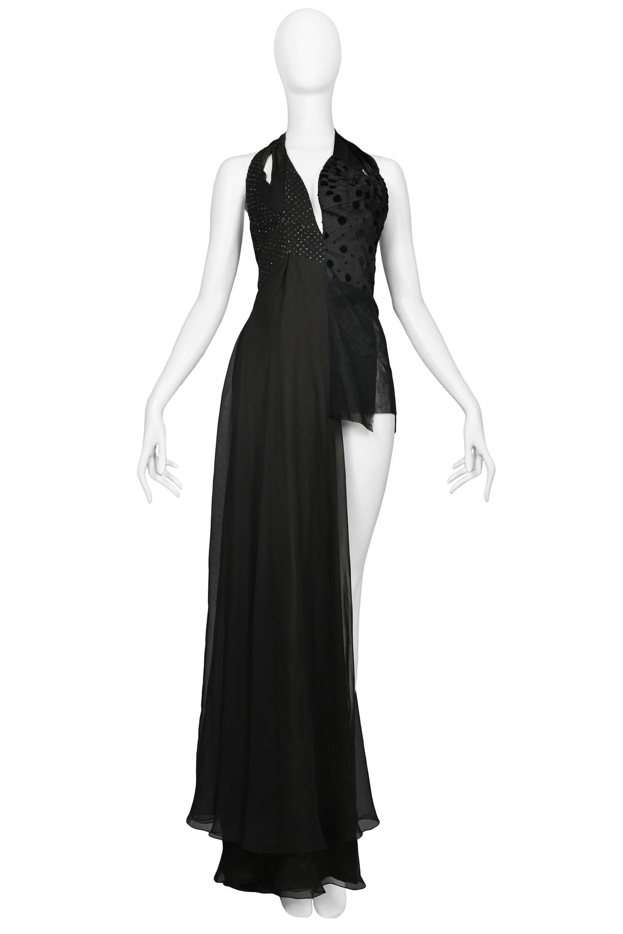 Resurrection Vintage is excited to offer a vintage Maison Martin Margiela black asymmetrical evening gown featuring one covered leg, one short leg, a halter bodice, and contrasting fabrics. 

Maison Martin Margiela
Size: Small
Measurements: Bust 30