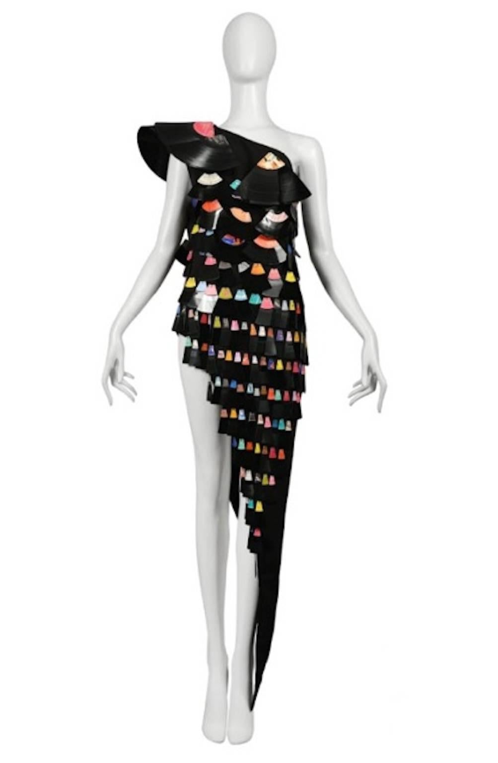 Vintage Maison Martin Margiela Couture Artisanal Record Dress. Crepe de chine dress adorned with 33 and 45 RPM records. The records have been cut and then shaped while warm to mold to the shape of the body. 33 hours to produce. Runway piece from the