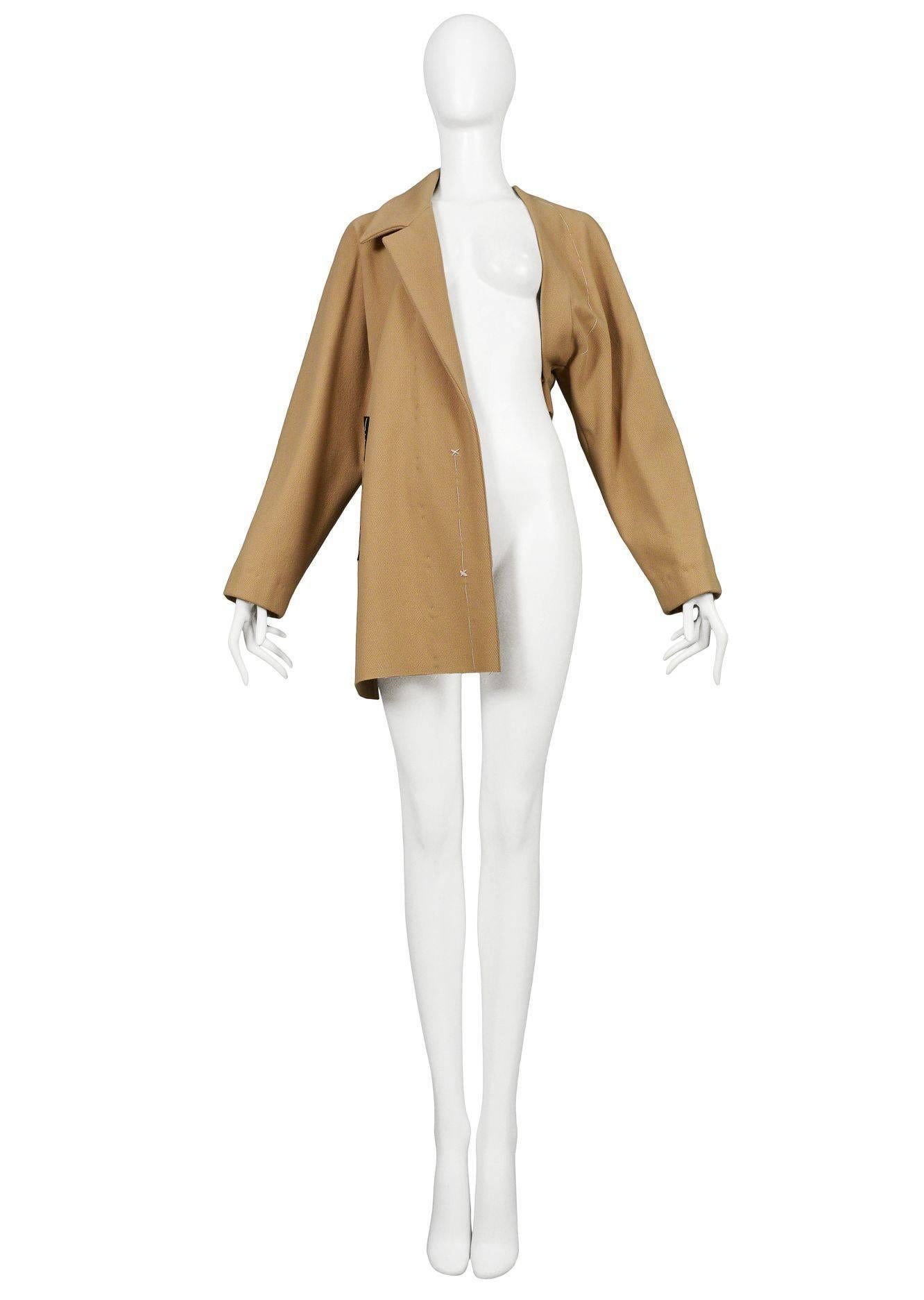 Vintage Maison Martin Margiela Basting Coat. Tan suiting lapel coat with white basting stitching throughout. Runway piece from the Autumn / Winter 1997 Collection.