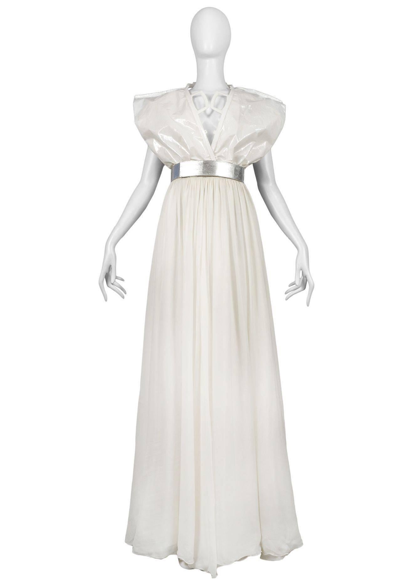 Vintage Maison Martin Margiela Artisanal Plastic Bag Gown. Two plastic bags lined with silk taffeta form the bodice of the dress; the lower part in the silk mousse line is attached by a belt of metallic adhesive type. Details such as the handles and