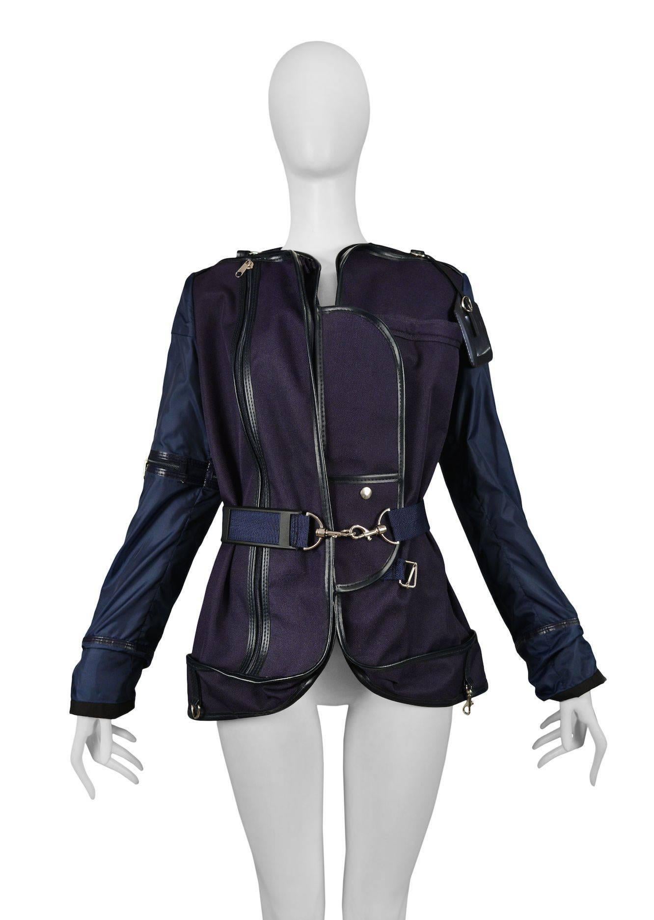 Vintage Maison Martin Margiela Couture Artisanal Garment Bag Jacket. A jacket made of navy blue garment bags. Buckles and straps throughout. ID tag at neck. Runway piece from the Spring / Summer 2007 Couture Collection.