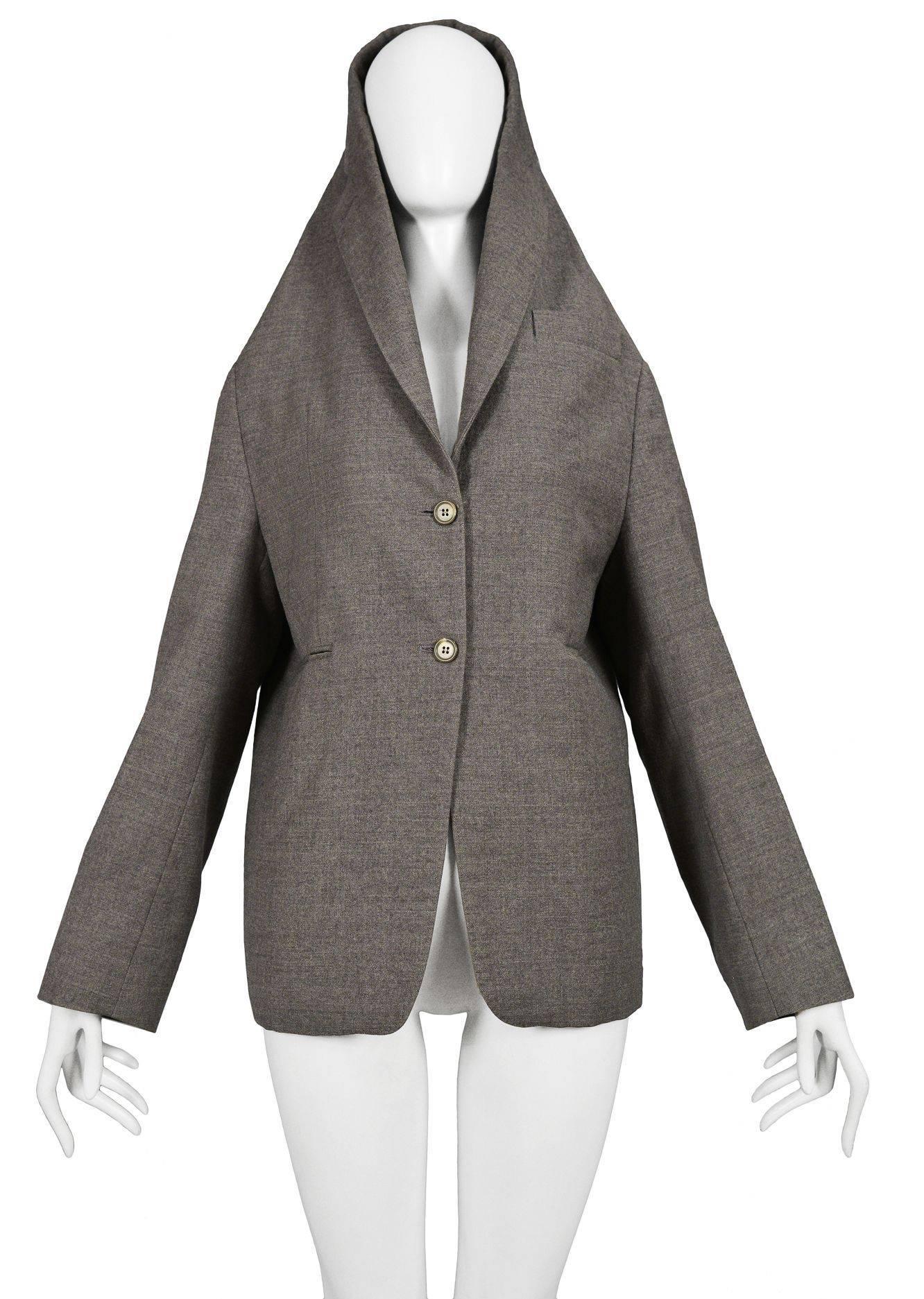 Vintage Maison Martin Margiela Artisanal Overhead Grey Blazer. Classic blazer with elongated collar that turns into a hood. Runway piece from the Autumn / Winter 2005 Collection.