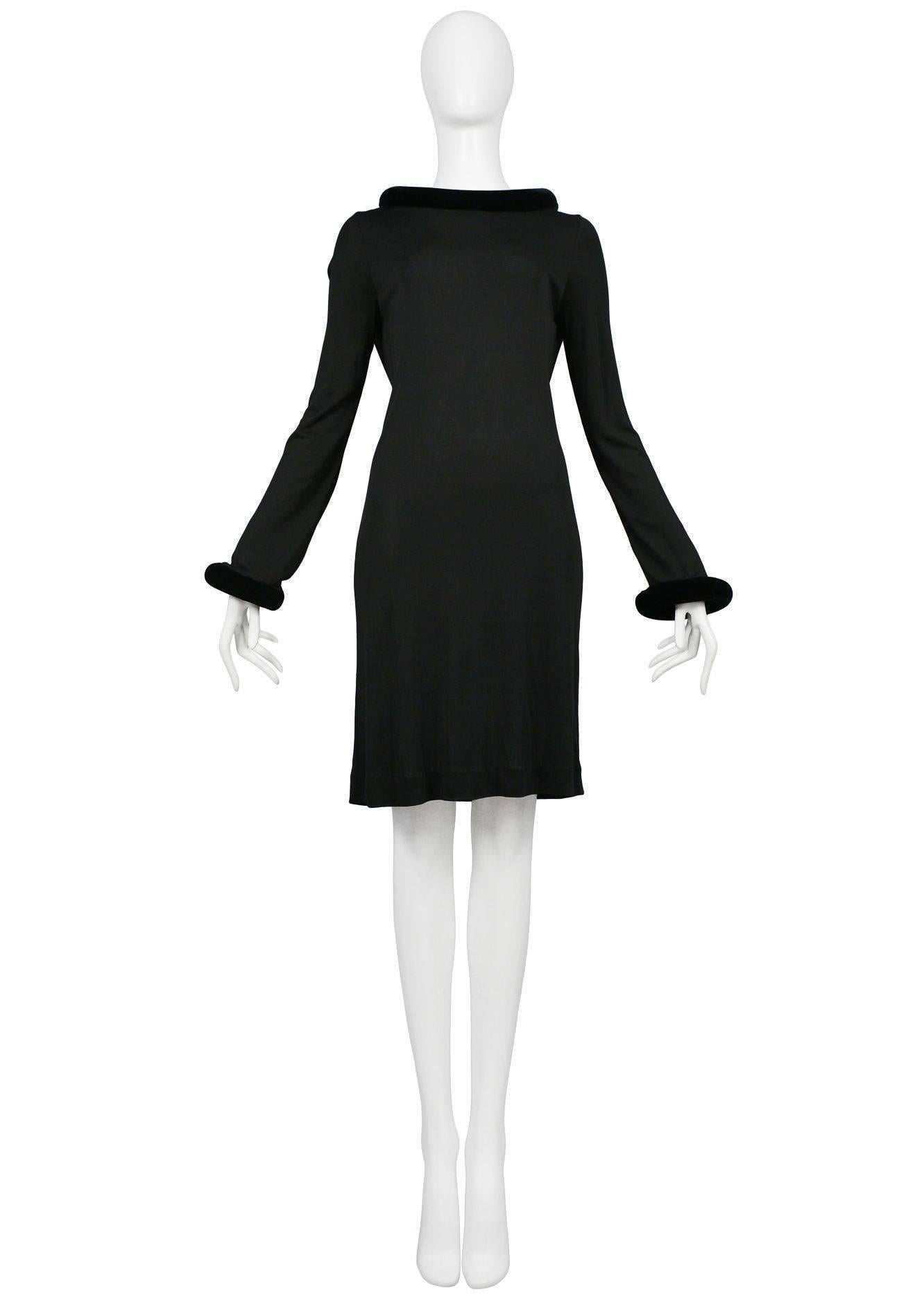 Vintage Jean Paul Gaultier iconic black mini dress with padded tube cuff and collar.
