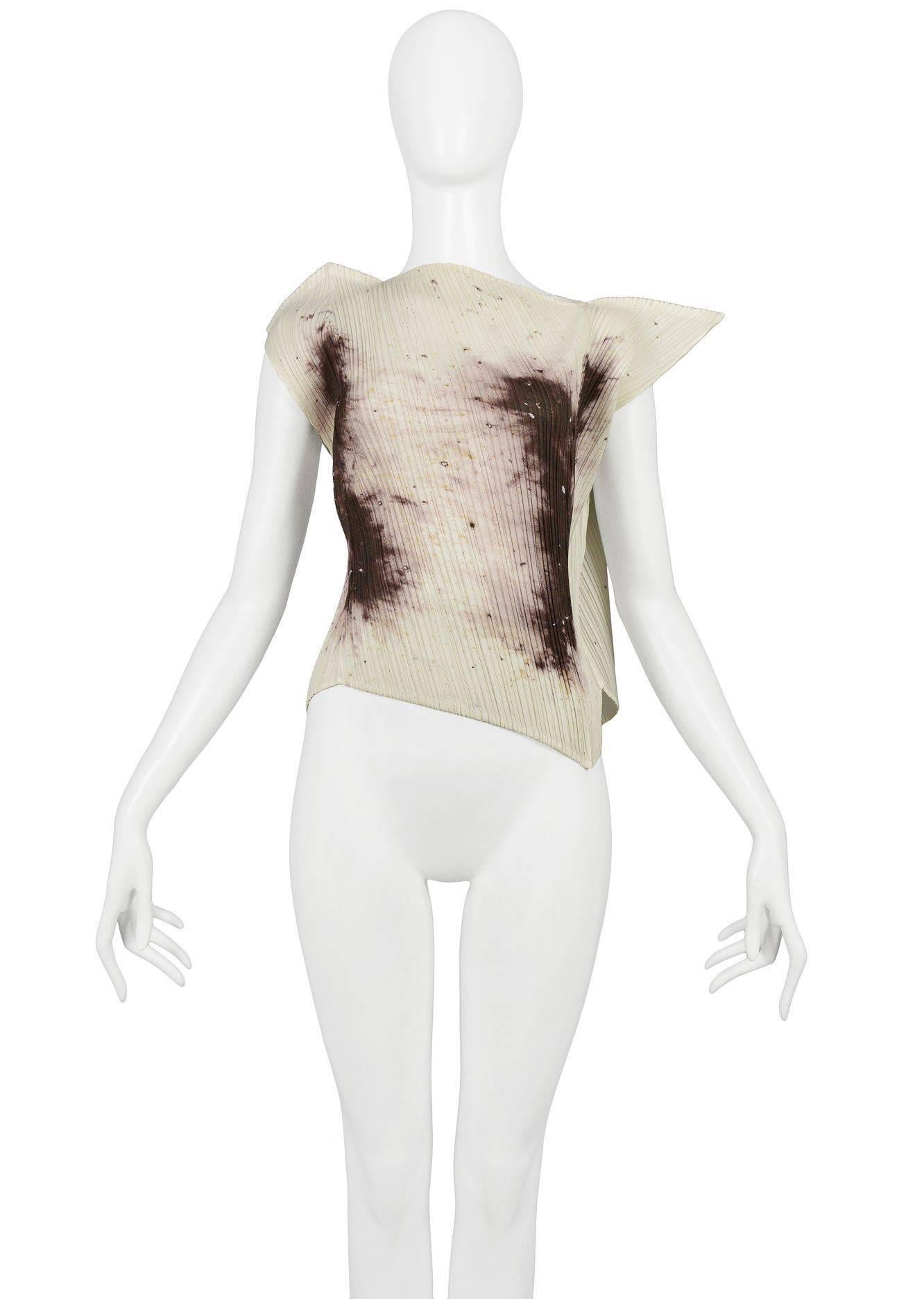 Issey Miyake and Cai Guo-Qiang 'gunpowder' print top from the Guest Artist, Series 4, 1998. The top is pleated polyester with an abstract gunpowder trail print and features an asymmetric neckline with points to shoulder and hem. This renowned