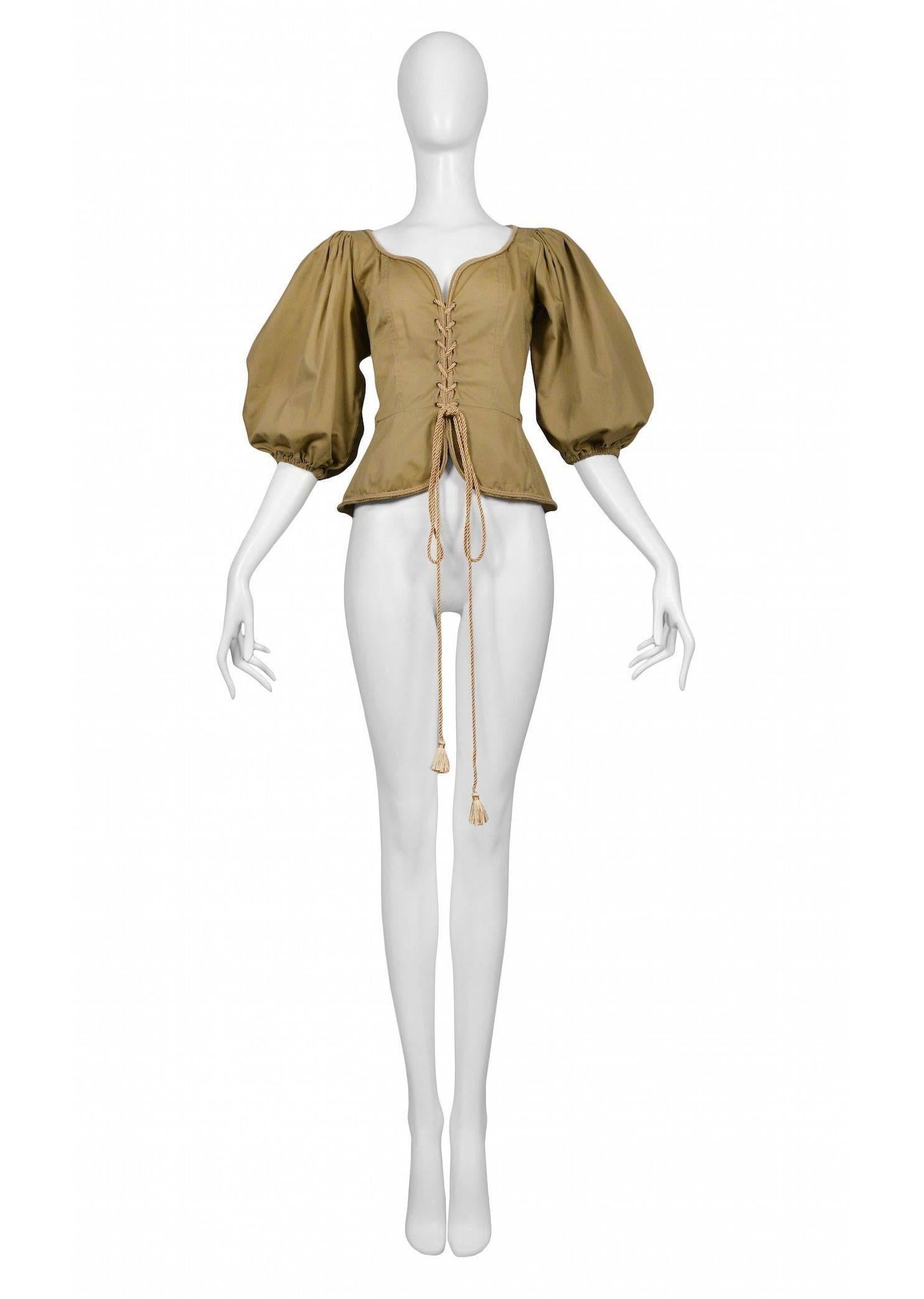 Vintage Yves Saint Laurent khaki safari corset peasant top featuring a built in peplum below the waist, rope tassel lacing up the front and full peasant style sleeves.