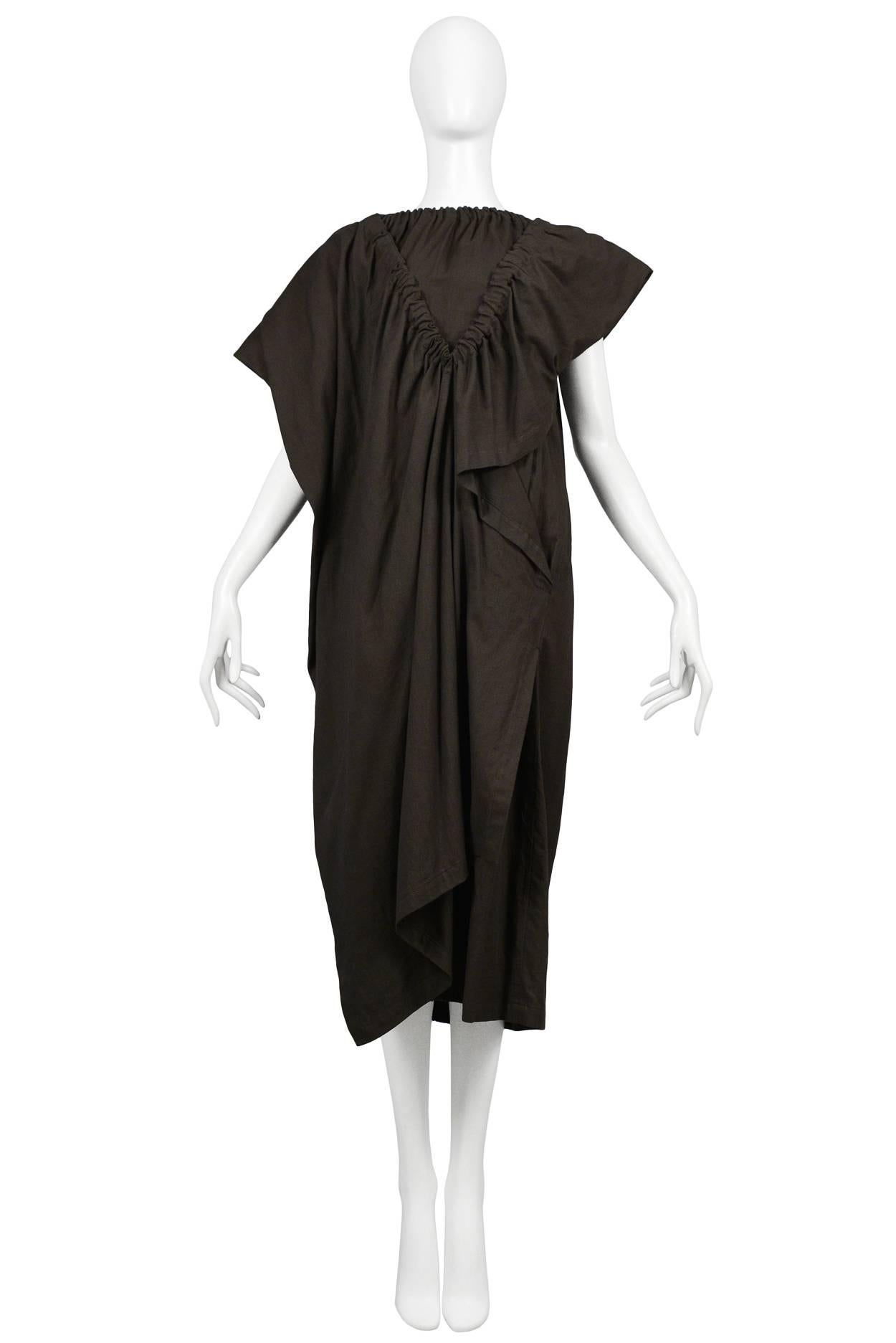Early and rare Comme des Garcons brown cotton layer dress with elastic band detailing. Collection 1984.