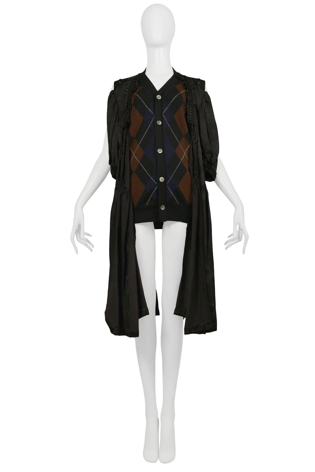 Comme des Garcons navy and brown argyle button front cardigan sweater with attached black satin fancy dress. Collection AW 2006.