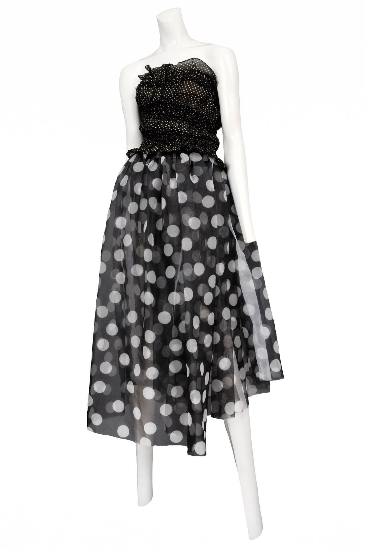 Vintage Tao for Comme des Garcons strapless polka dress featuring a tube style top with small scale black and white polka dots attached to a gathered long skirt with large scale black and white polka dots. A runway piece from the Spring / Summer