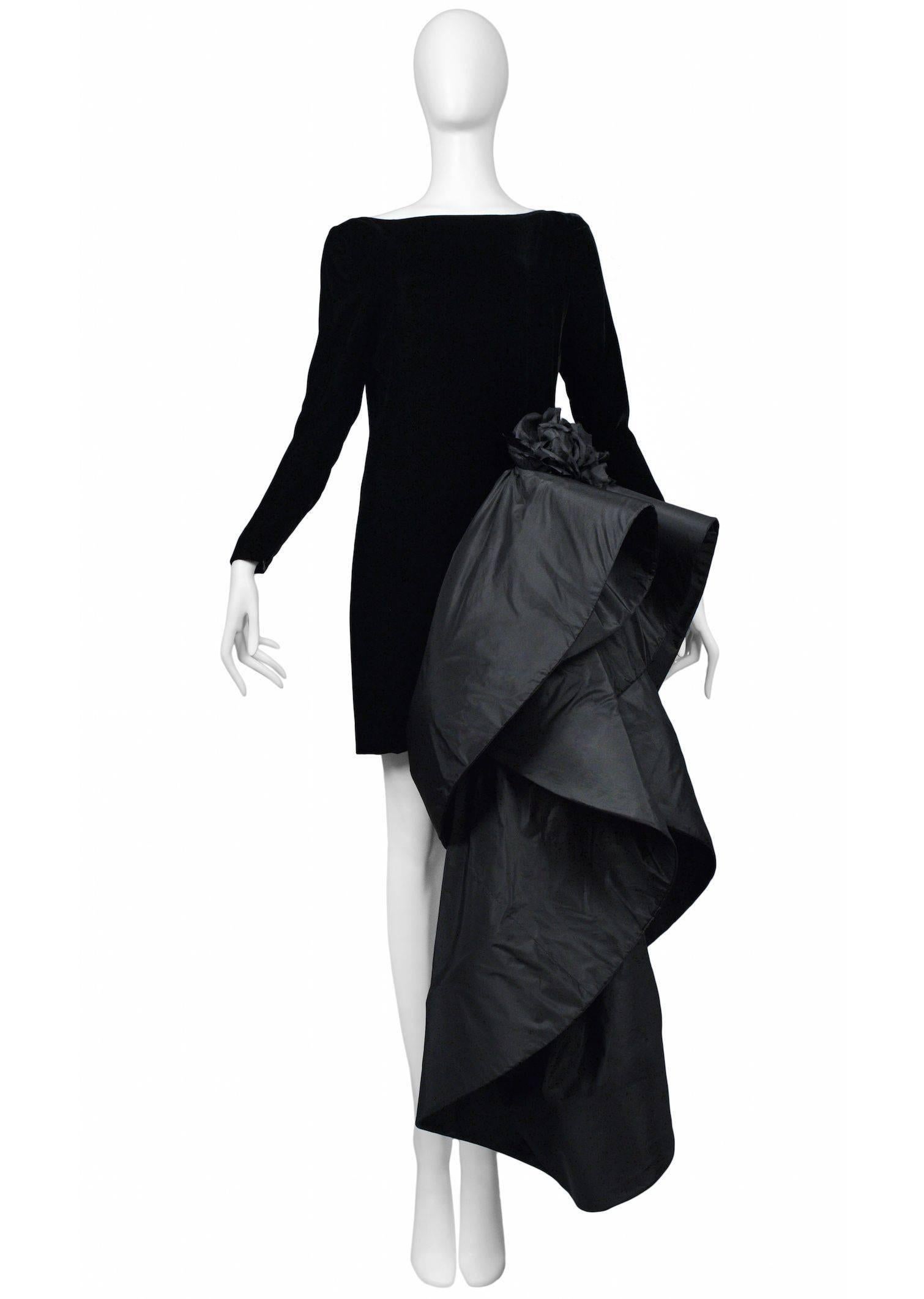 Pierre Cardin Couture black silk velvet long sleeve dress with avant garde attached ball gown train with ruffle panel and rose. Circa, 1986 -1993.