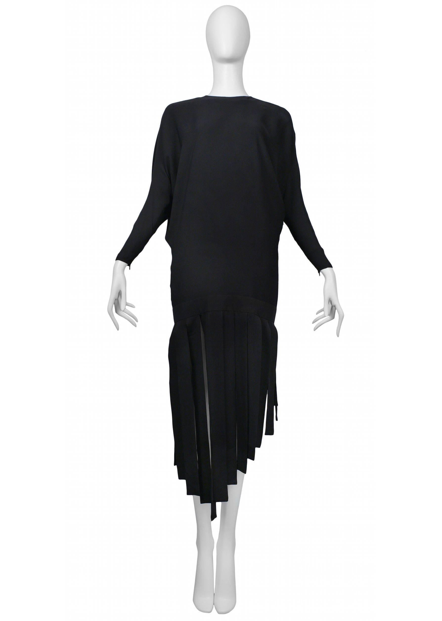 Pierre Cardin Couture dress features a drop waist and uneven hem. Based on famous 