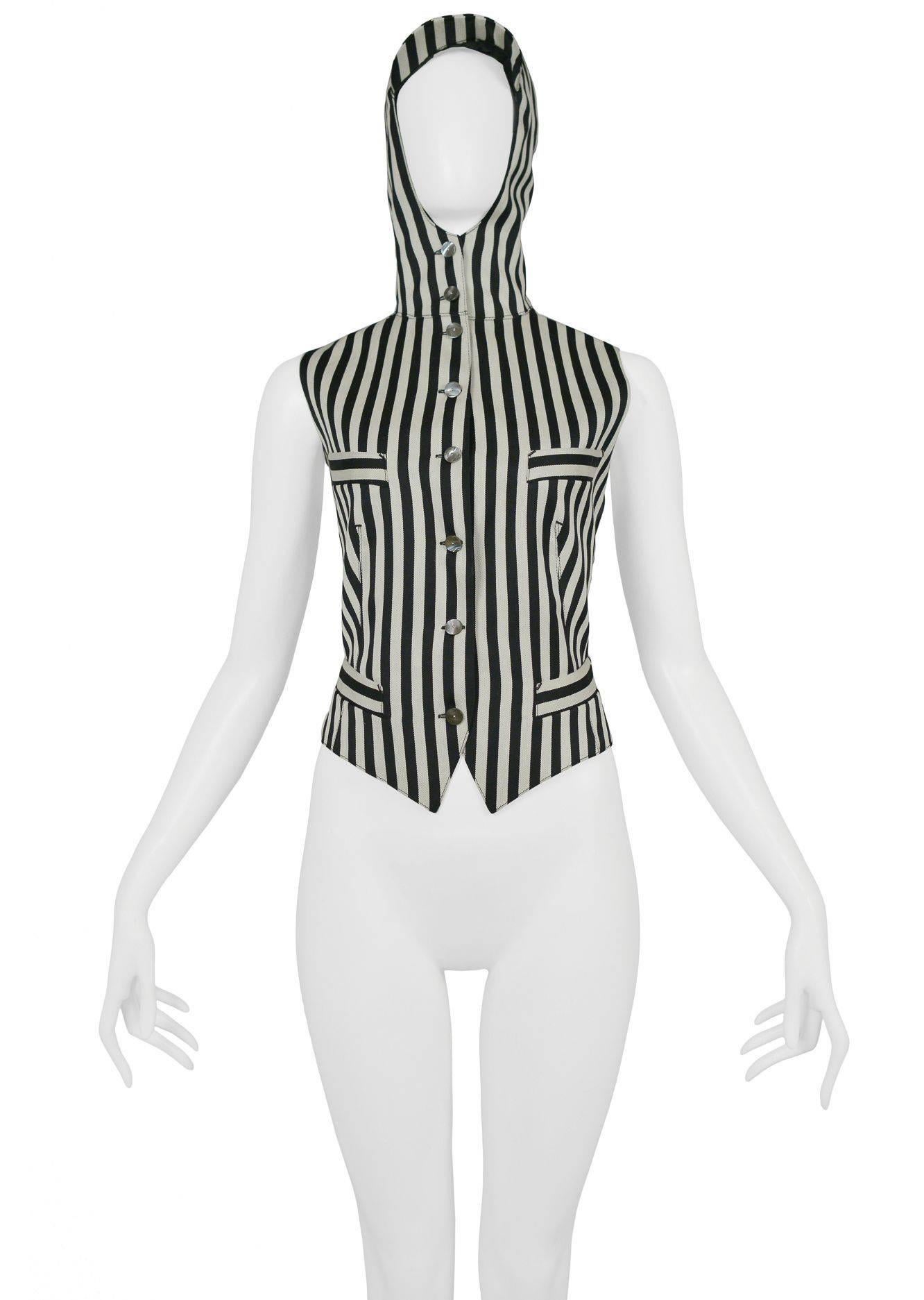 Vintage Jean Paul Gaultier black & white stripe vest with hood and brim. Collection 1991.

Excellent Vintage Condition.

Size: 42