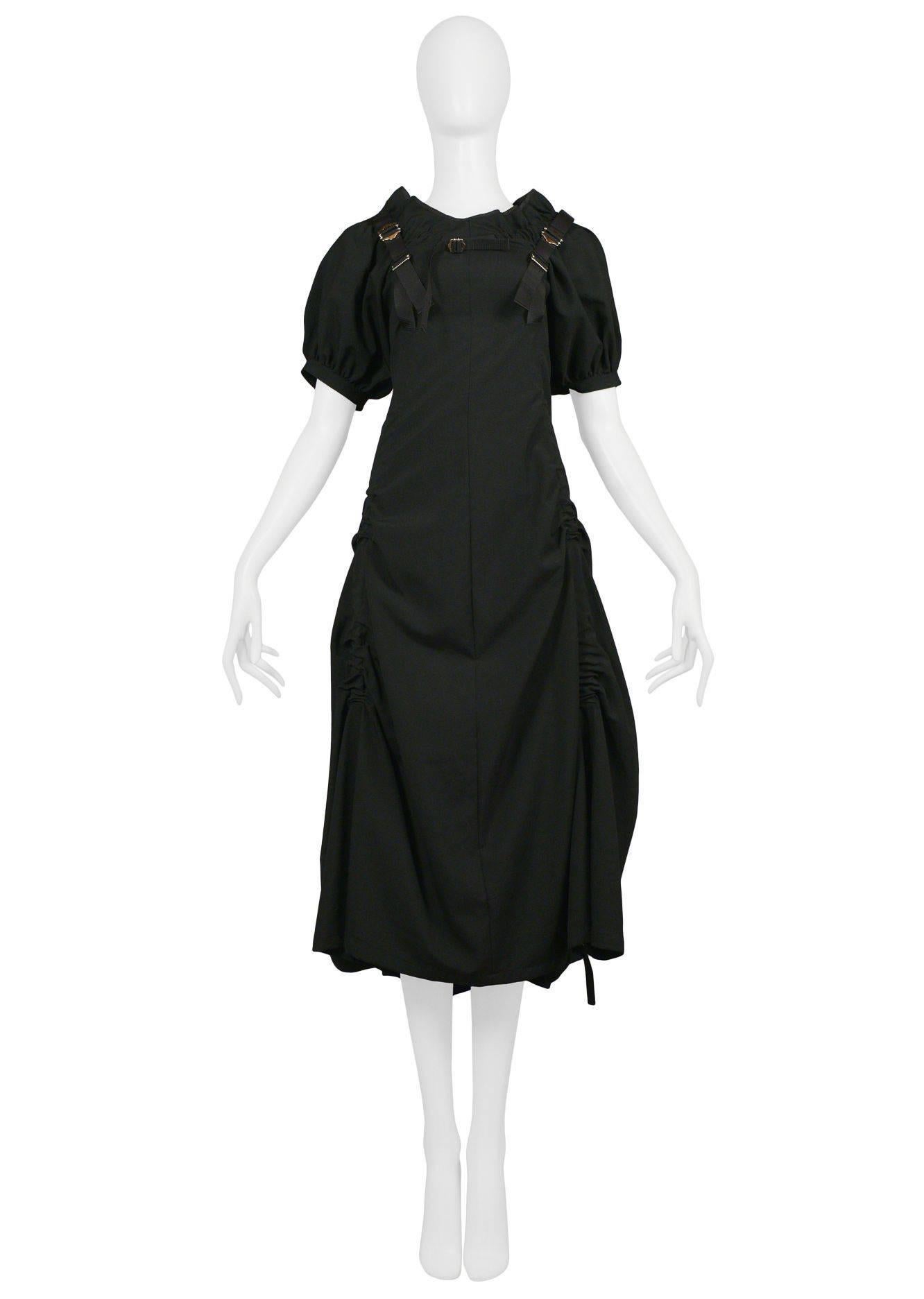 Vintage Junya Watanabe for Comme des Garcons black parachute dress featuring a keyhole open back with black straps and hardware. Collection SS 2003.