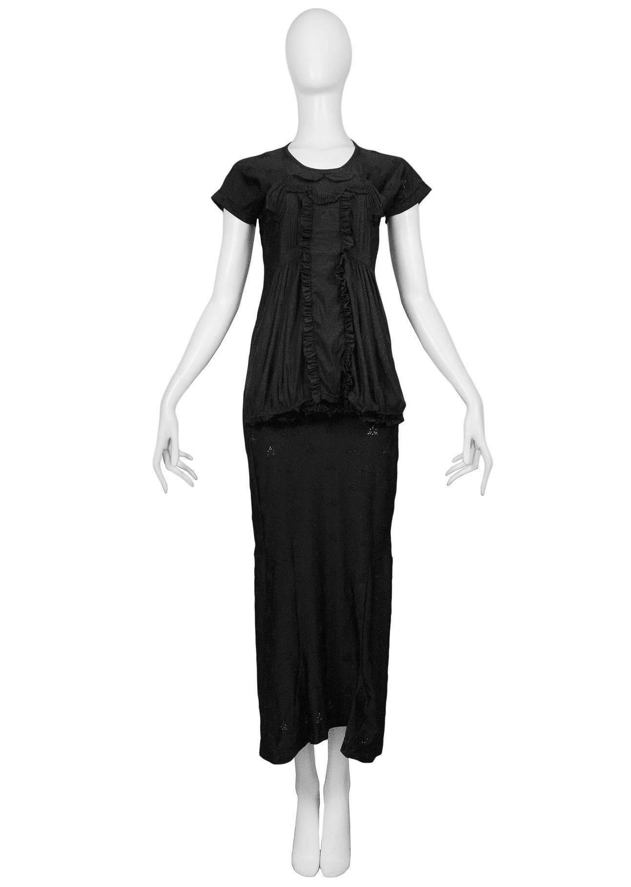 Vintage Comme des Garcons black maxi dress with mini size doll dress attached to front. Collection AW 2007.
