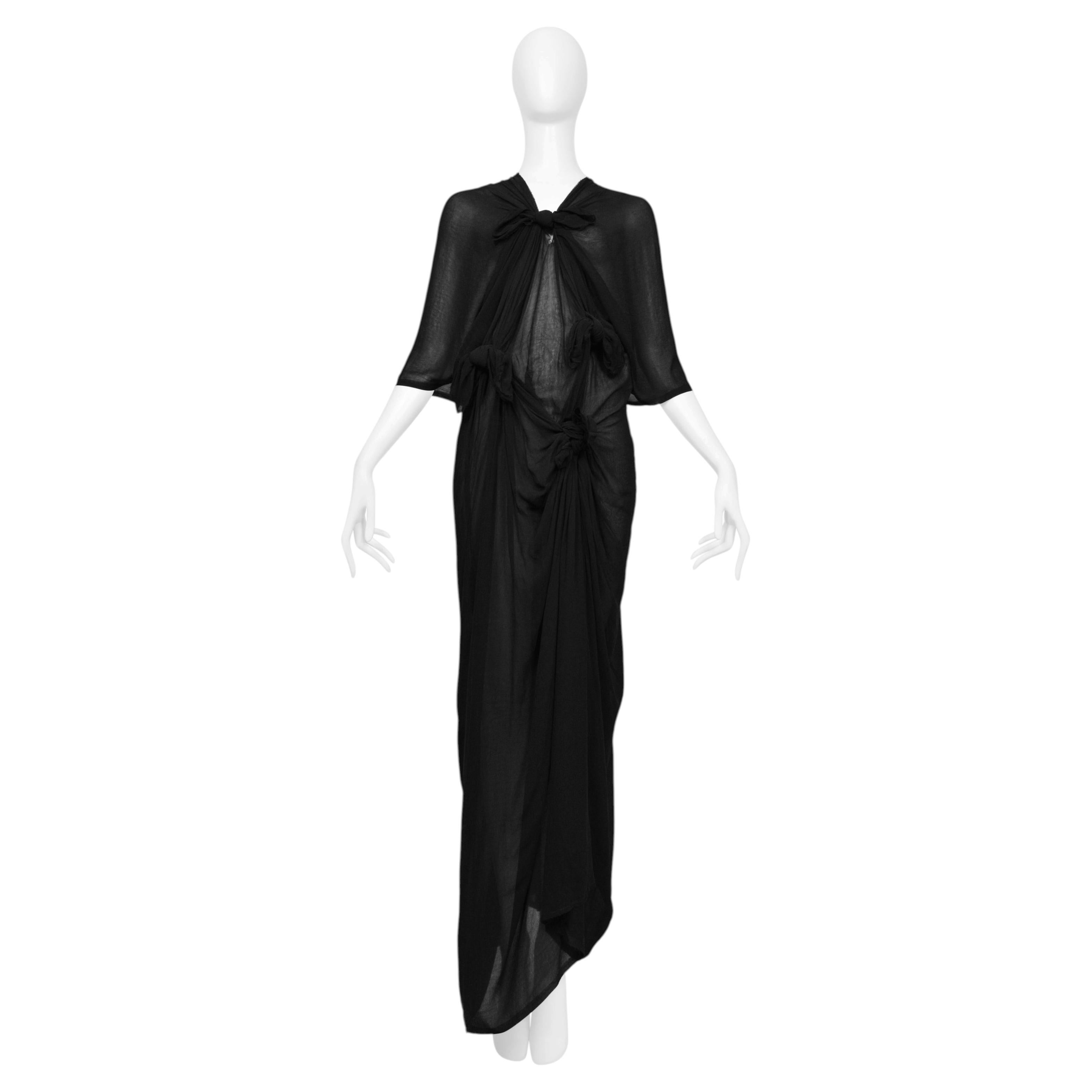 Vestido negro transparente con nudos de Comme Des Garçons
