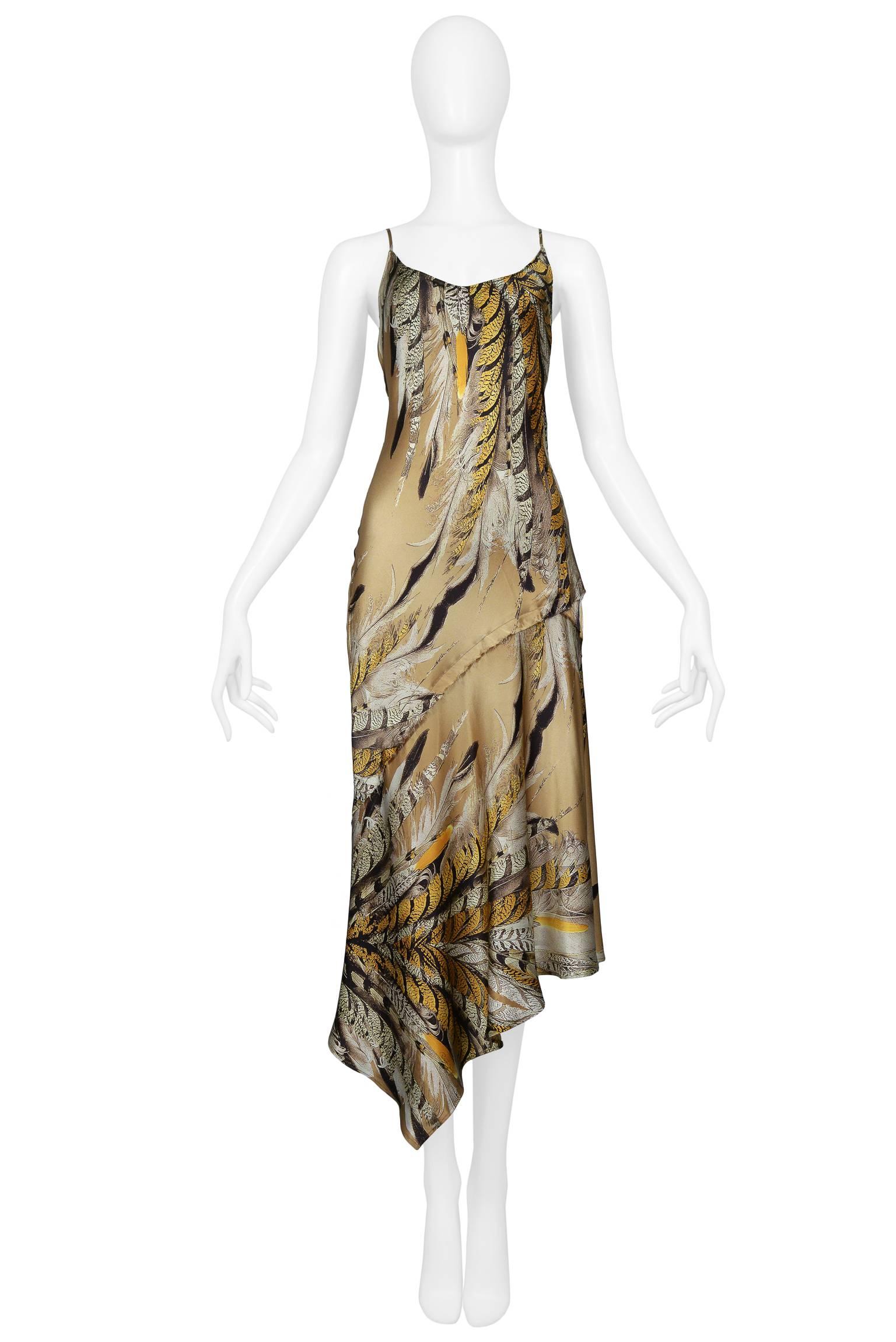 Roberto Cavalli satin neutral and golden tone feather print slip dress with spaghetti straps, asymmetrical hem, deep plunging open cowl back and some open and raw seams. Gorgeous fit. 