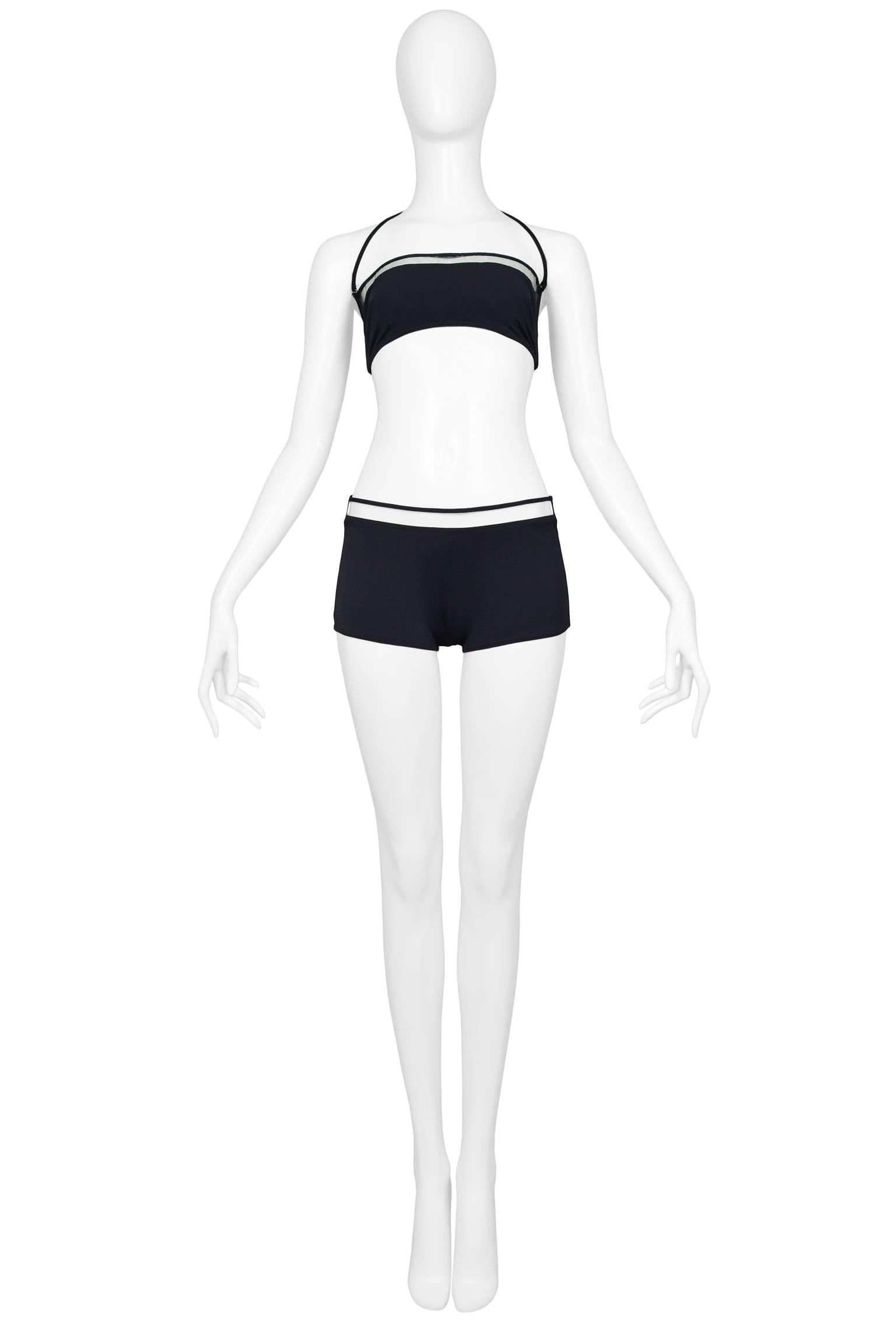 Fabulous Paco Rabanne futuristic mod black lycra bikini swim suit with clear vinyl insets at bust and waist. Top has detachable straps and can be worn as a bandeau. This suit has never worn. Deadstock vintage. Collection 2002. 