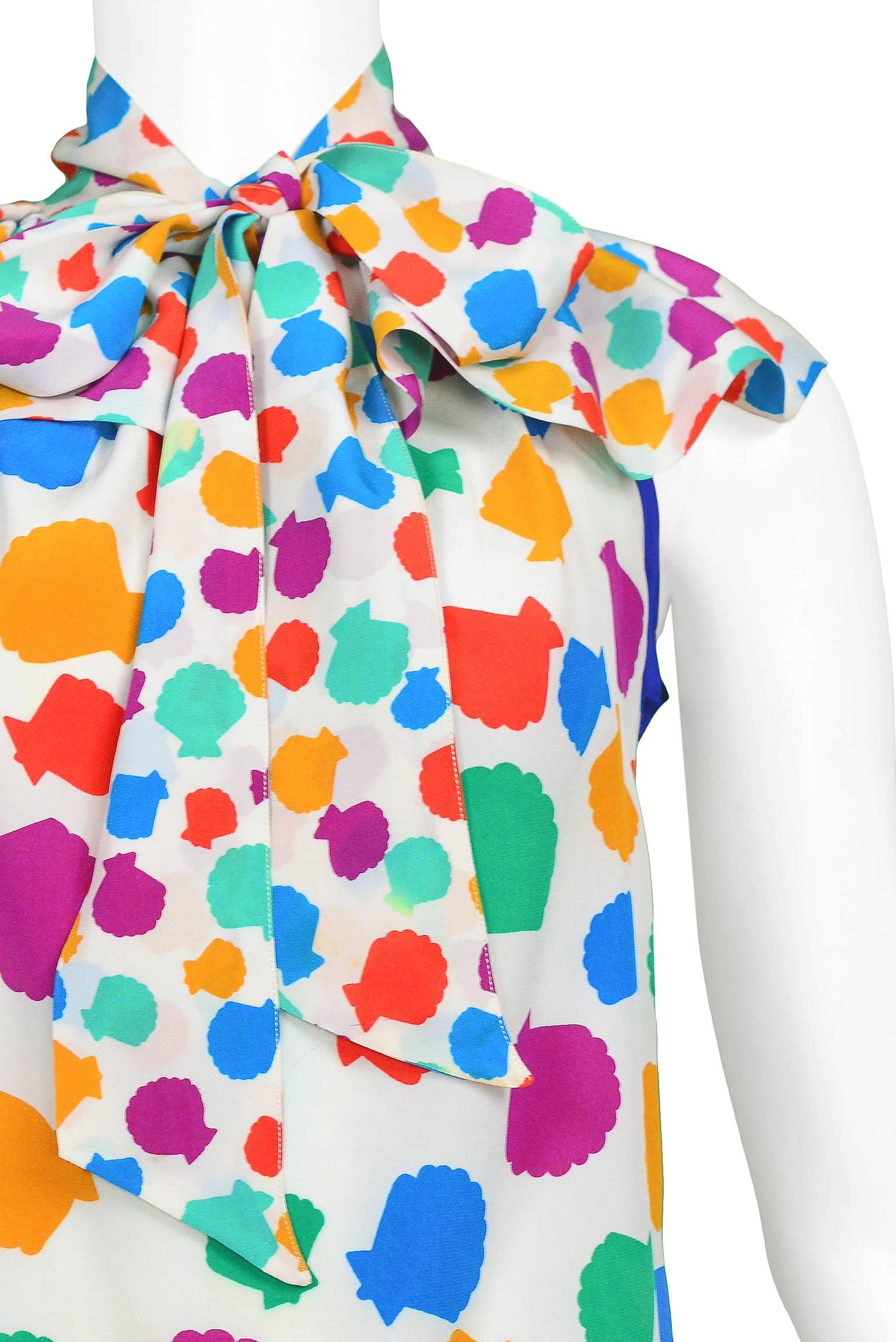 Multi color vintage Yves Saint Laurent "fan" print silk sleeveless blouse with ruffle collar  with tie. 